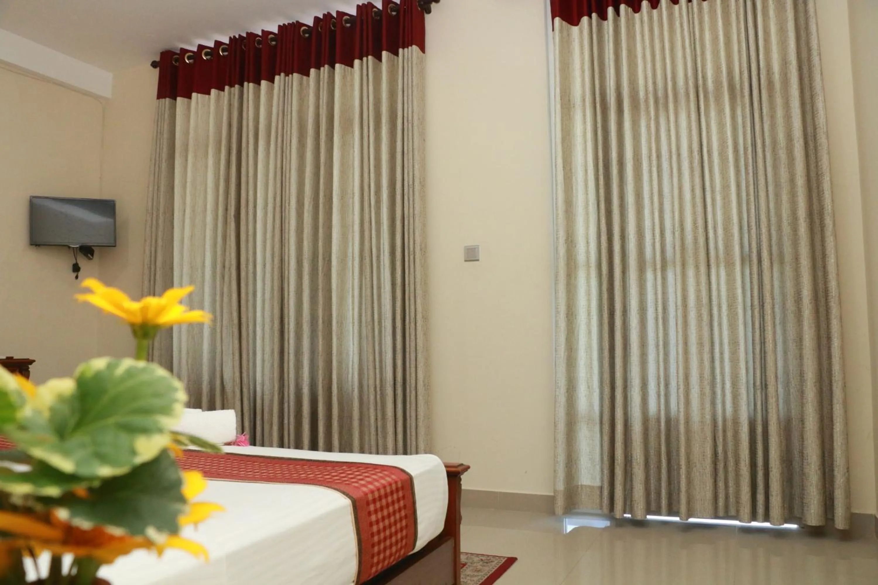 Bed in Queens Beach Hotel