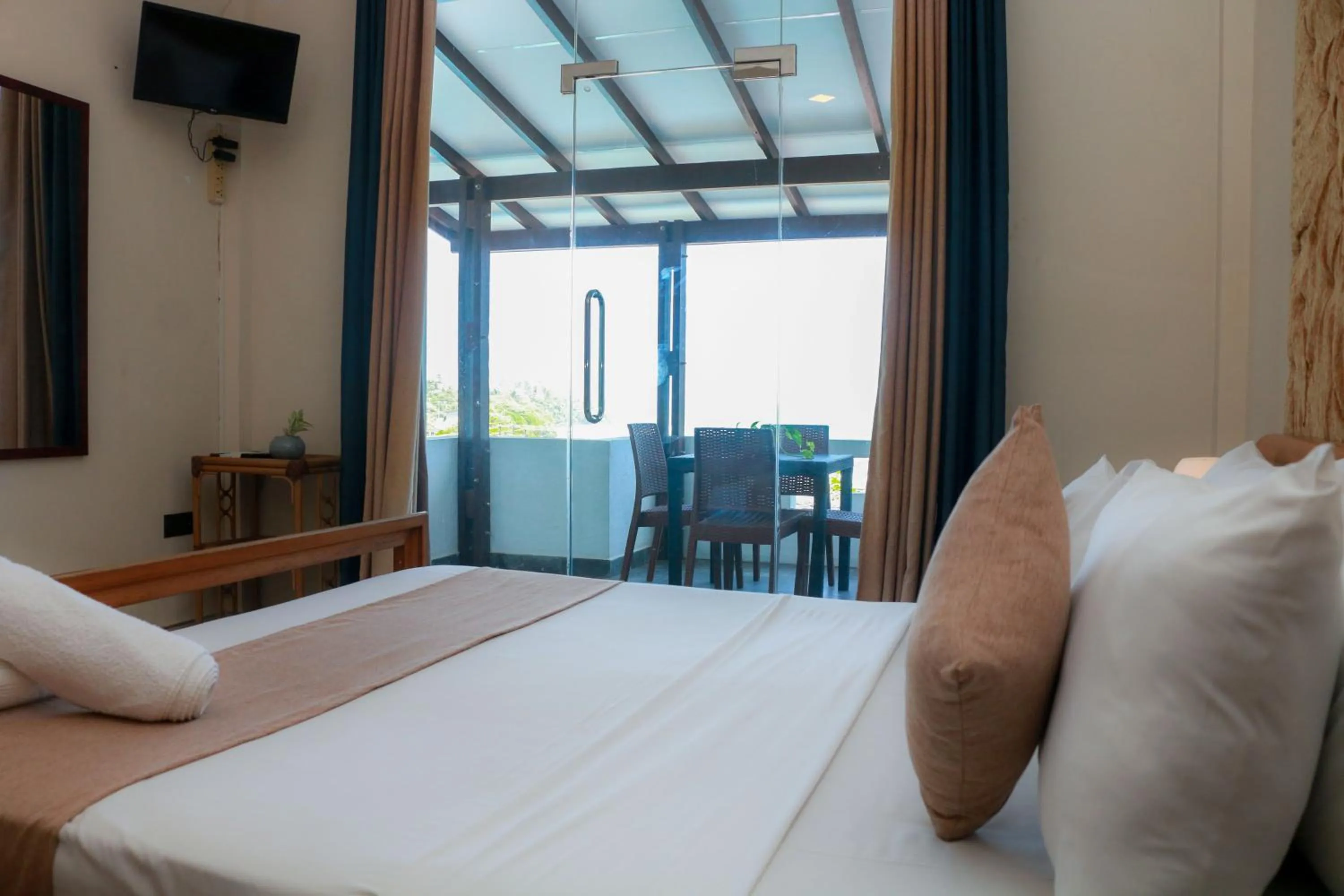 Bed in Queens Beach Hotel