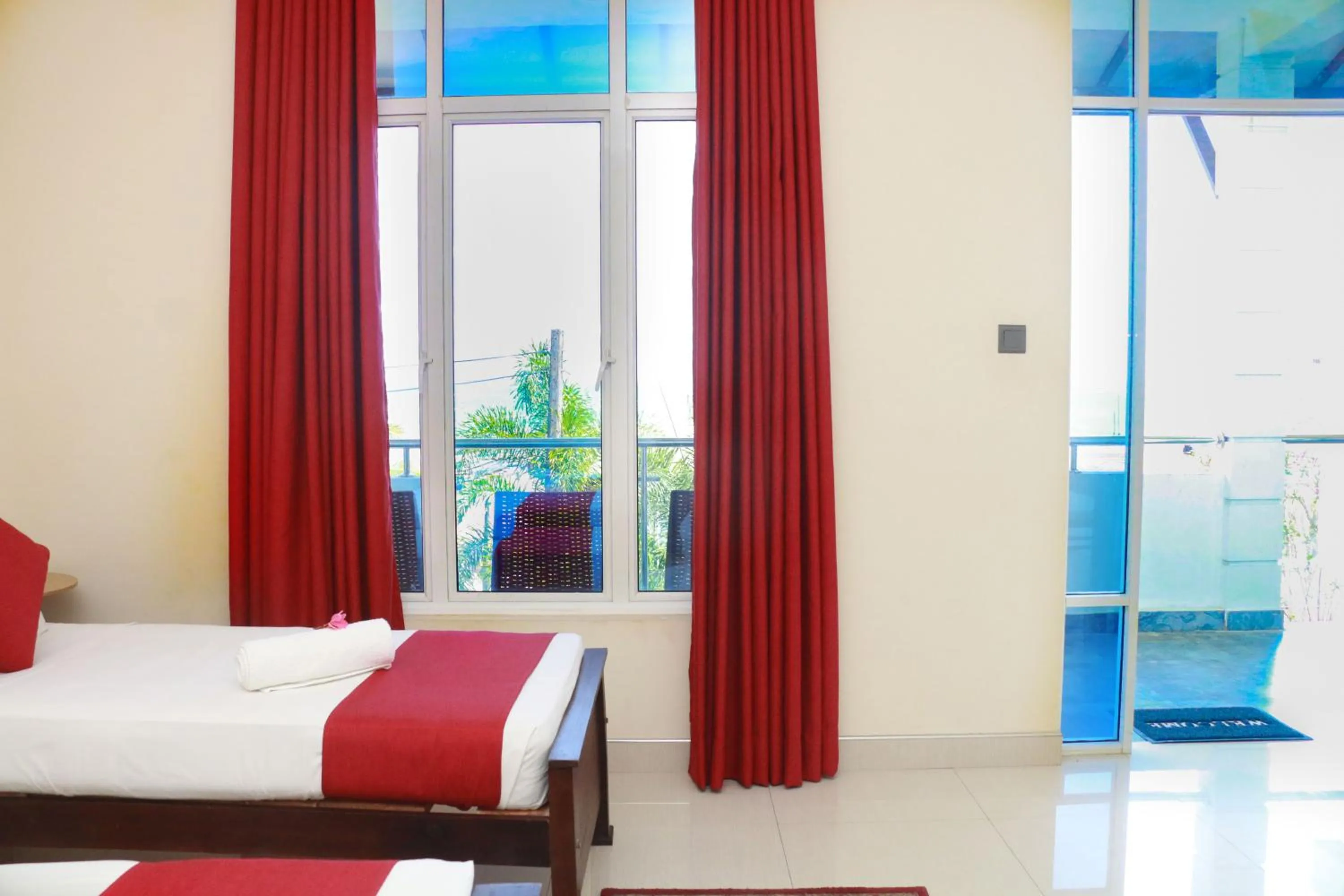 Bed in Queens Beach Hotel