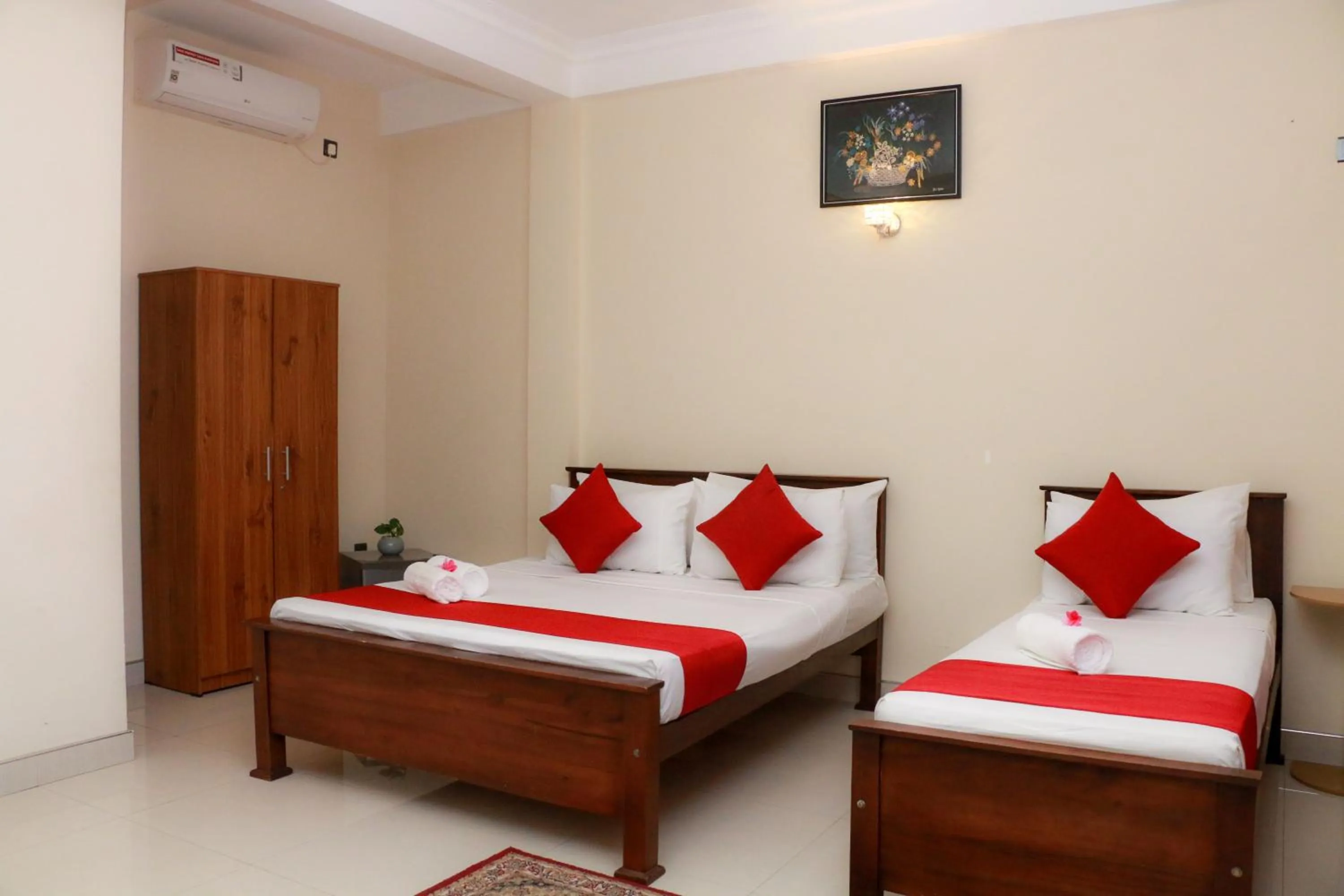 Bed in Queens Beach Hotel