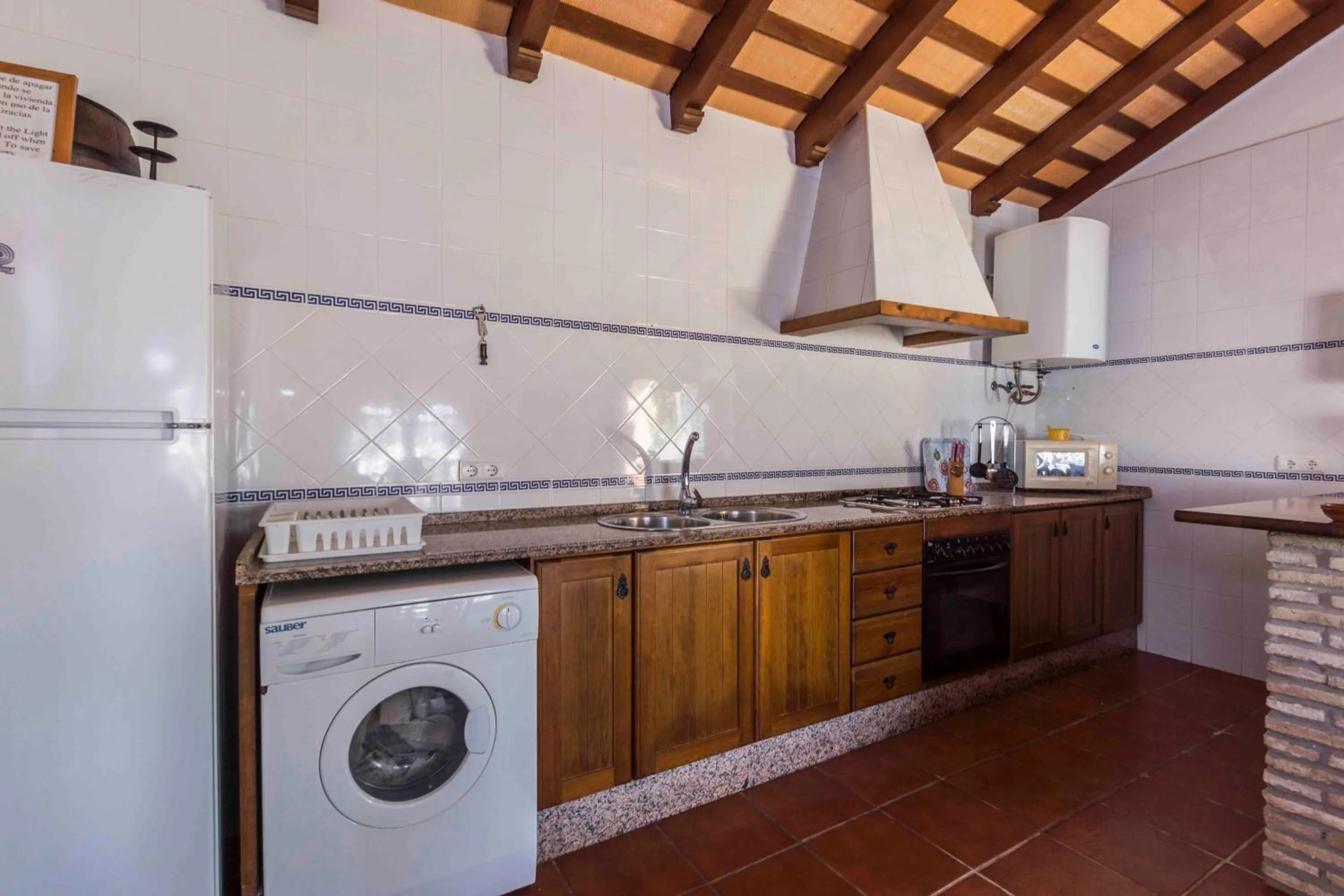 Kitchen or kitchenette in Vivienda Rural Atlántico Sur & Familias