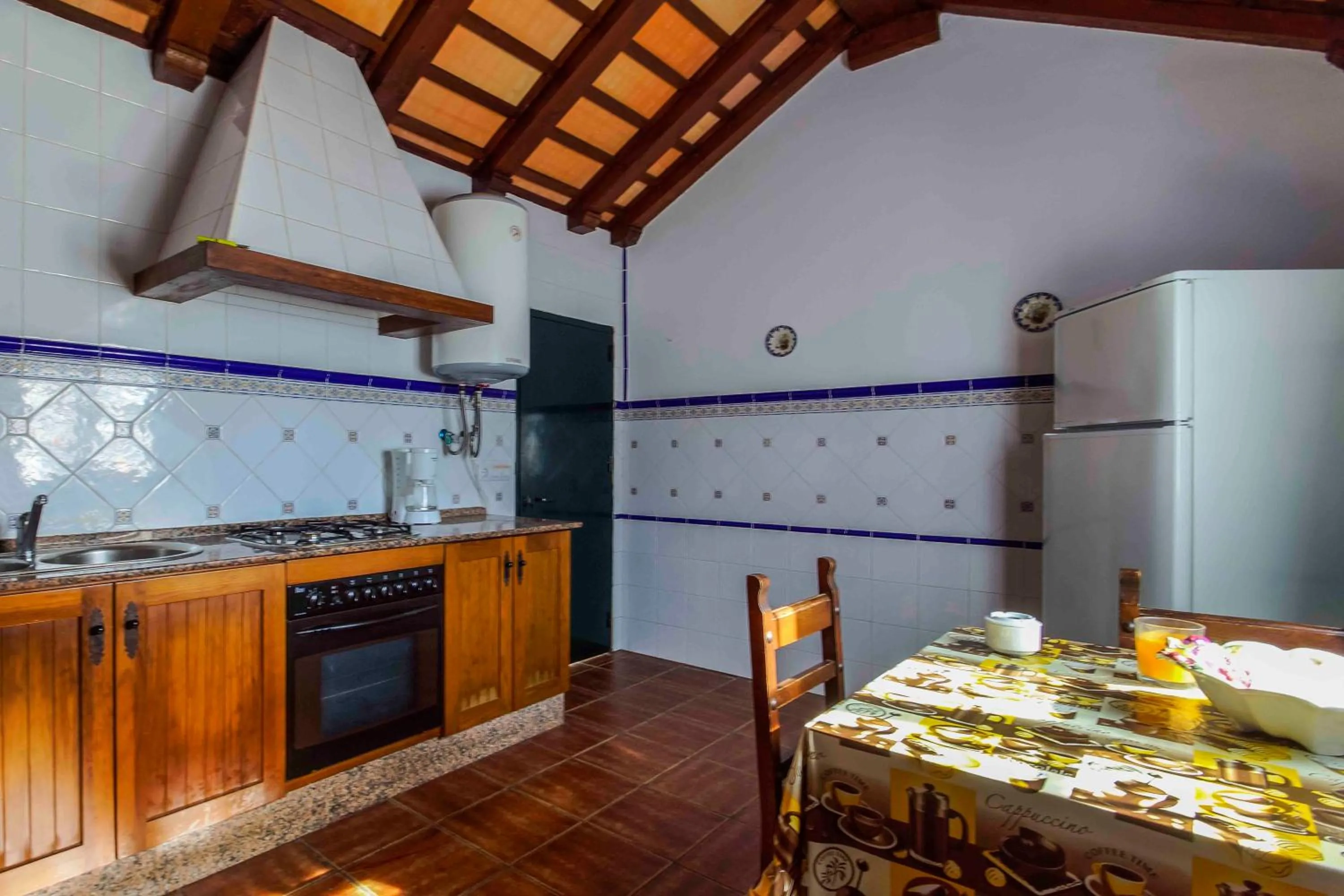 Kitchen or kitchenette in Vivienda Rural Atlántico Sur & Familias