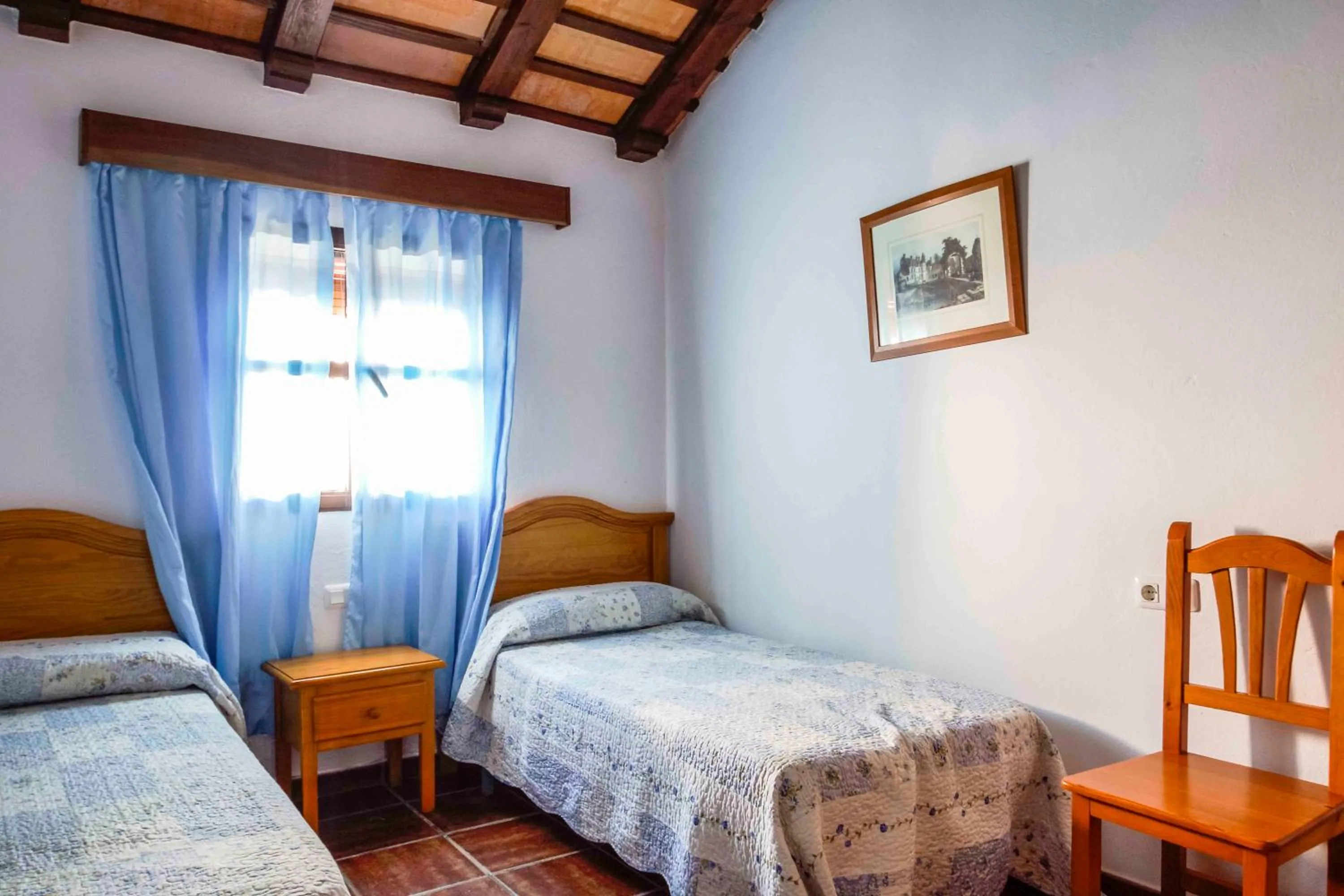 Bed in Vivienda Rural Atlántico Sur & Familias