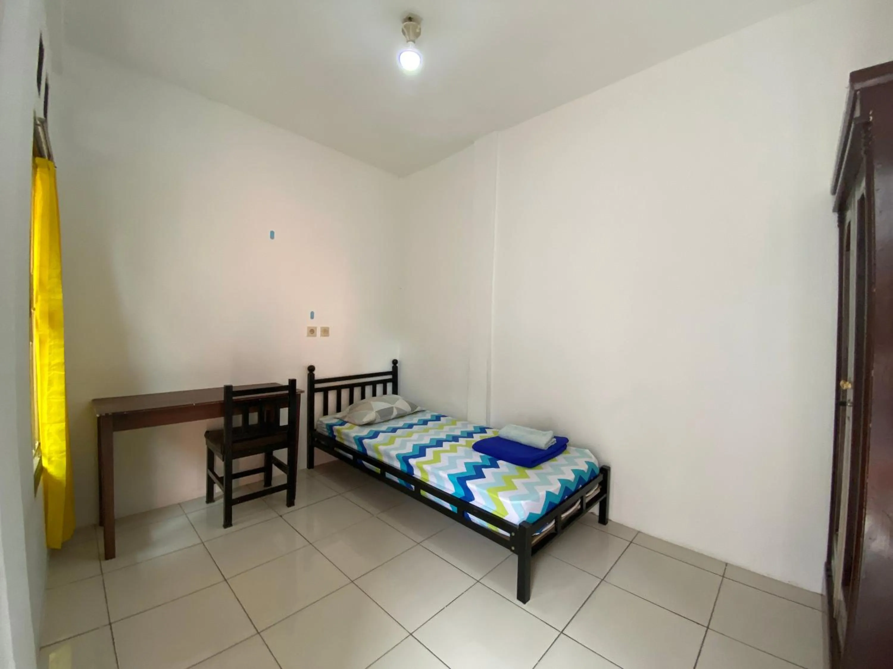 Bedroom in OYO 2562 Pondok Tajlibu Syifa Syariah