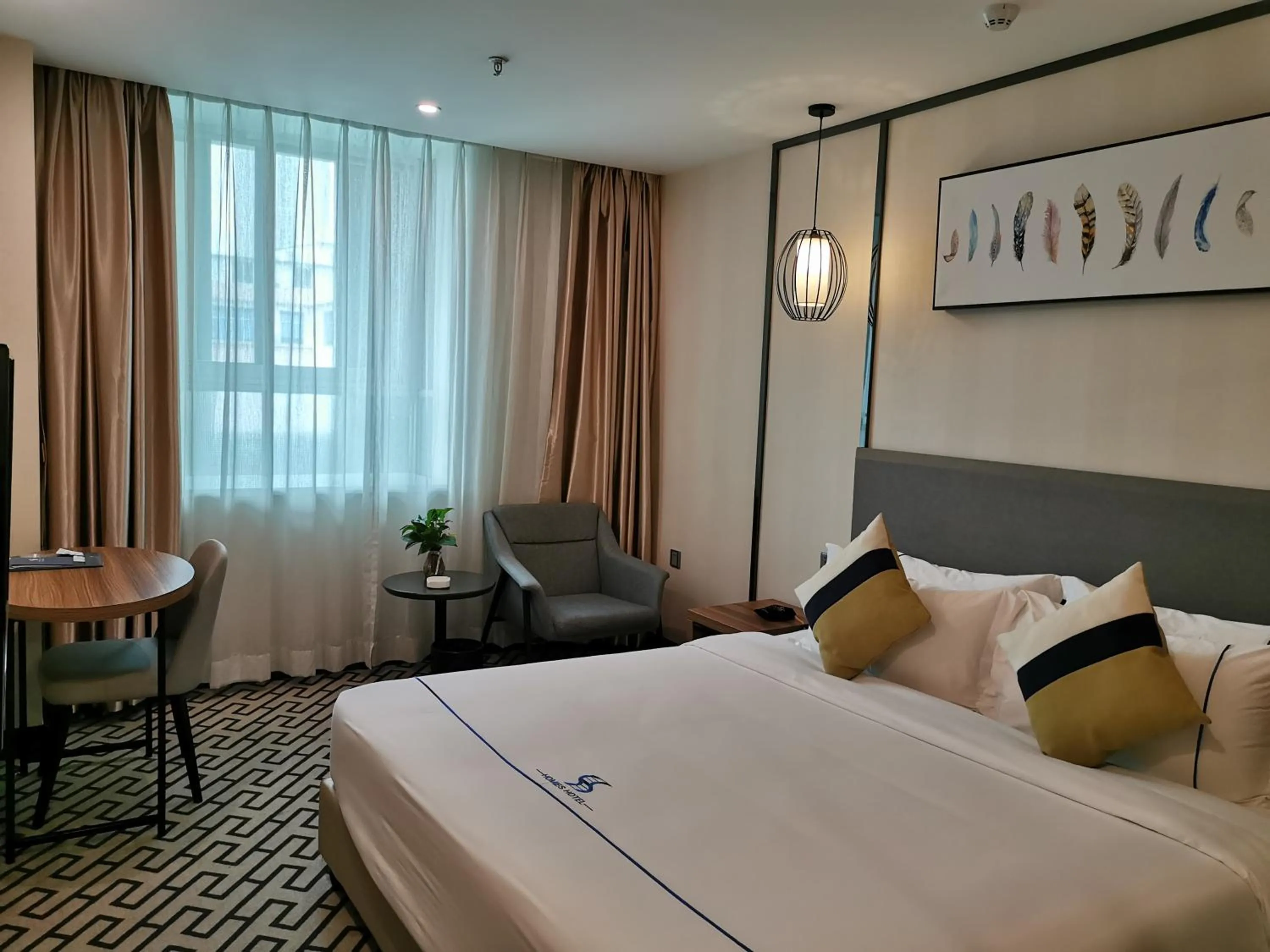 Bed in Guangzhou Homies Hotel