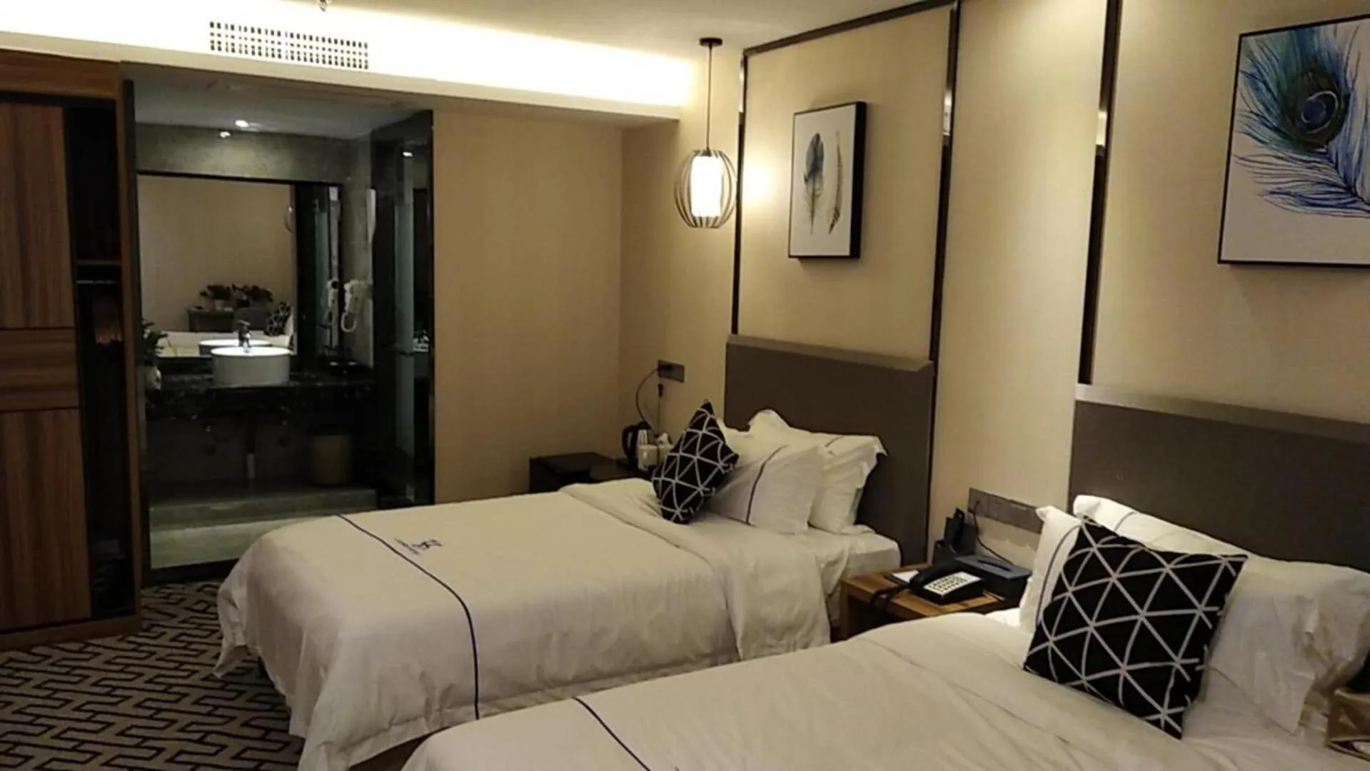 Bed in Guangzhou Homies Hotel