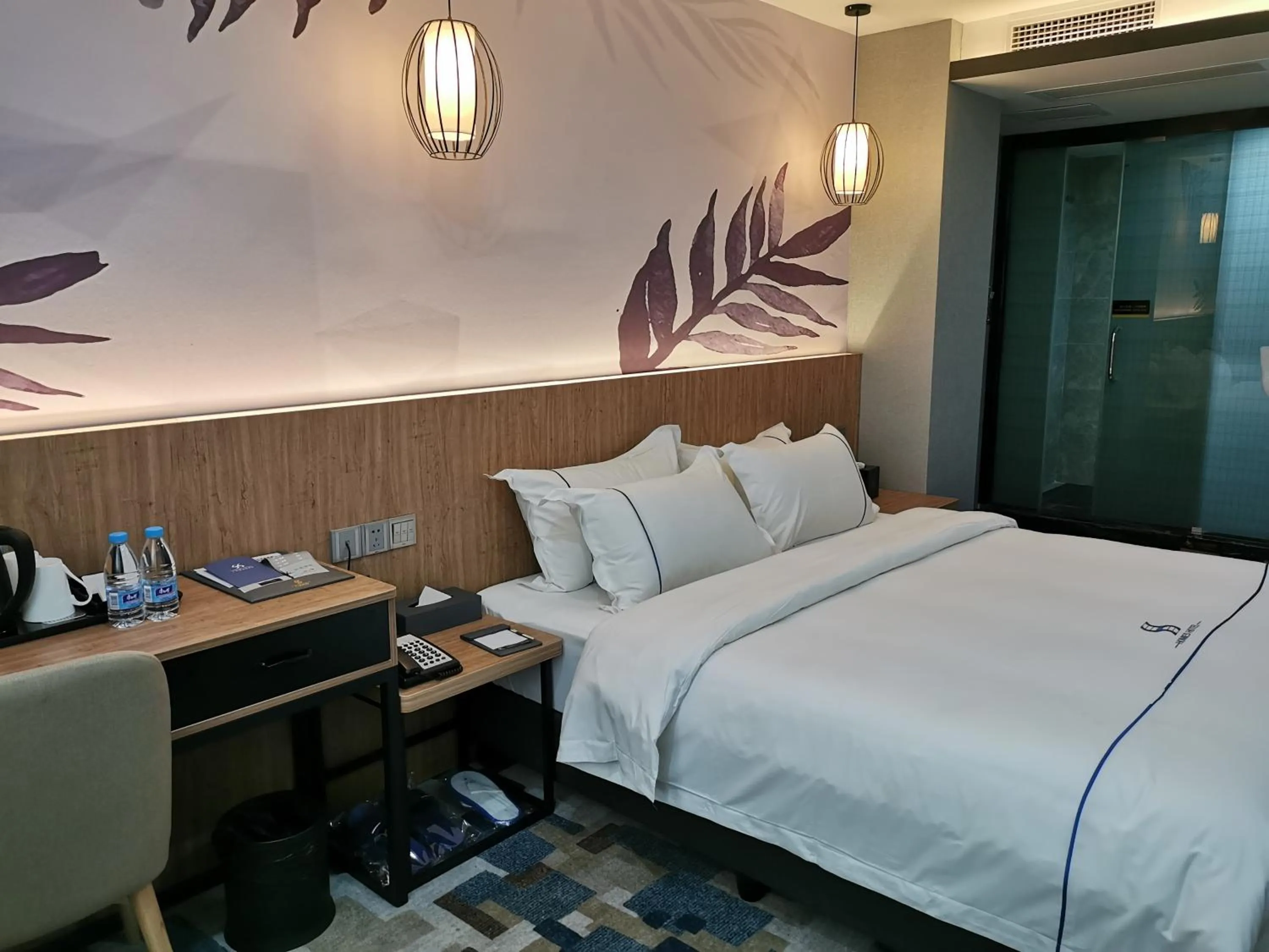 Bed in Guangzhou Homies Hotel