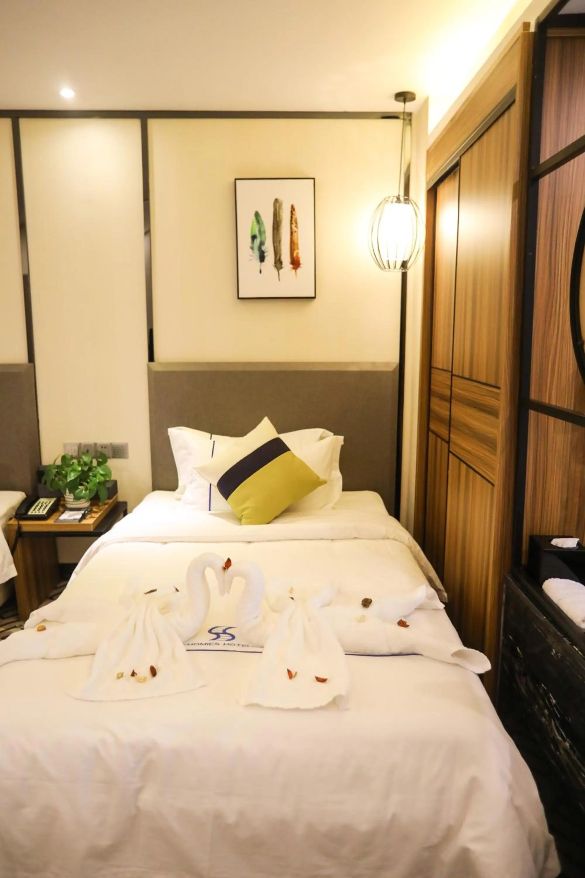 Bed in Guangzhou Homies Hotel