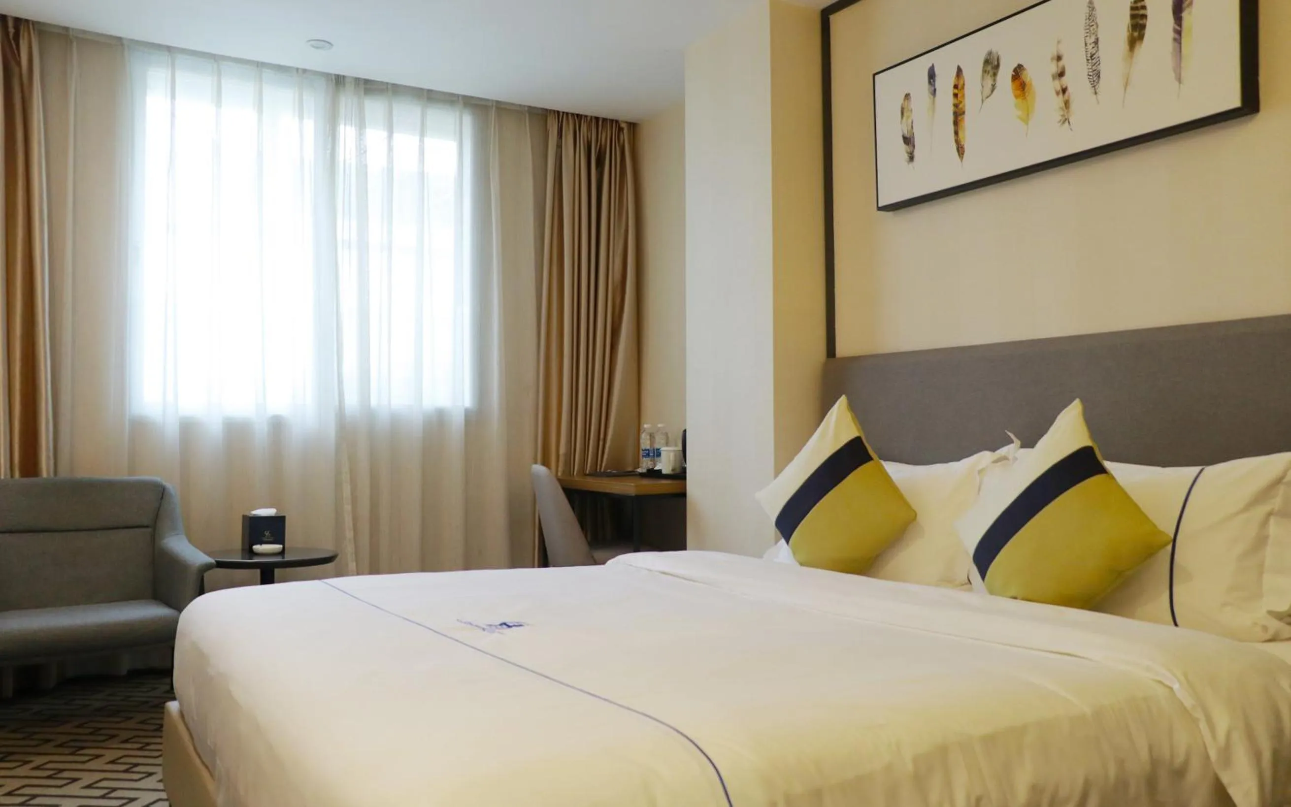 Bed in Guangzhou Homies Hotel