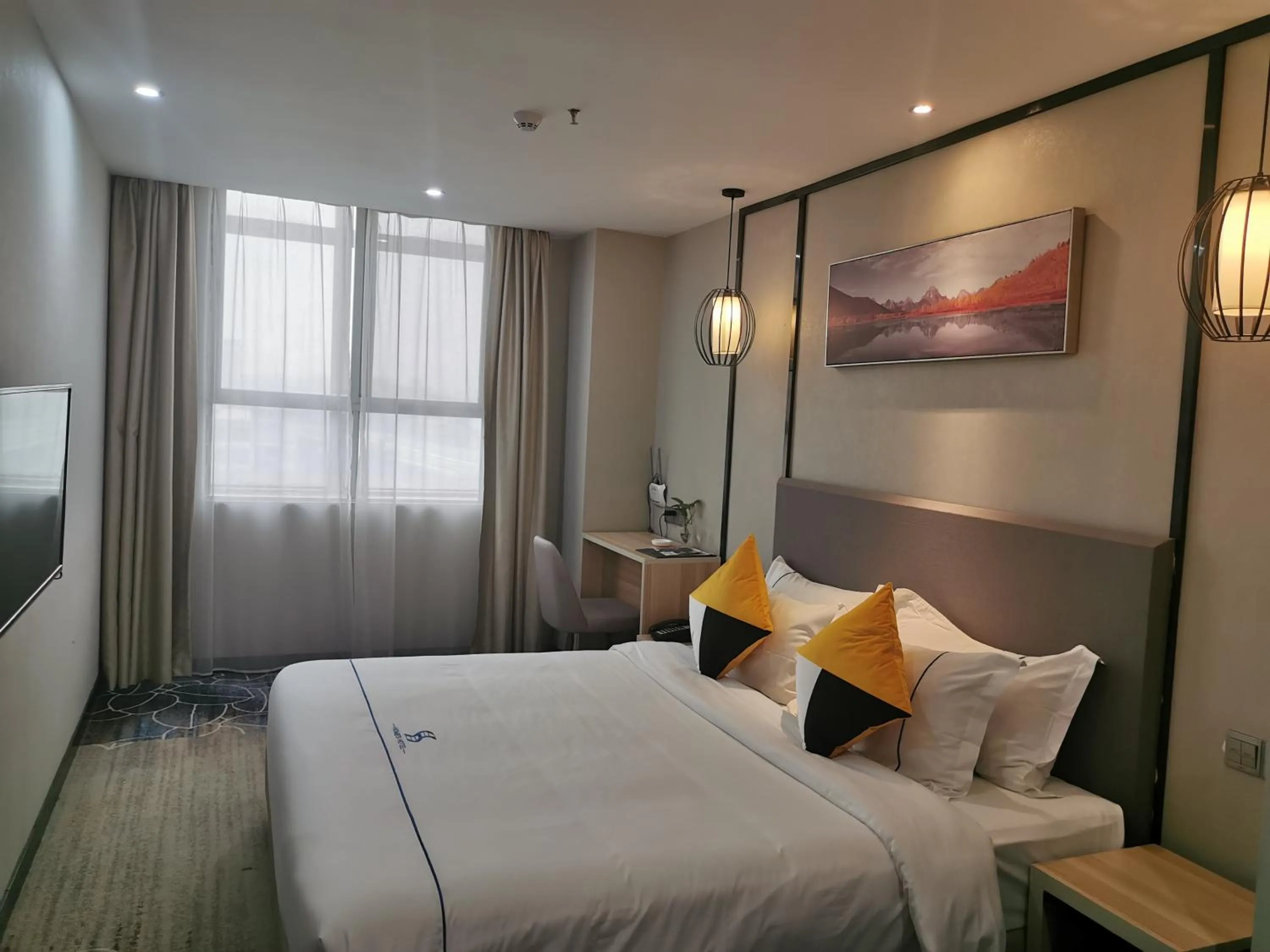 Bed in Guangzhou Homies Hotel