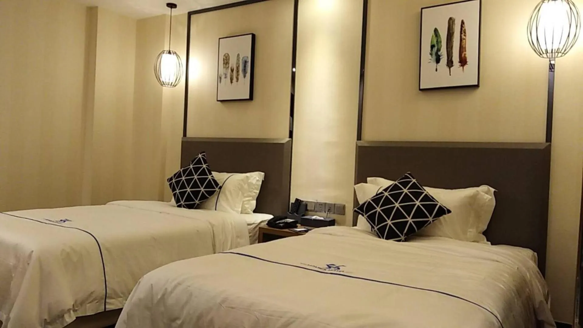 Bed in Guangzhou Homies Hotel