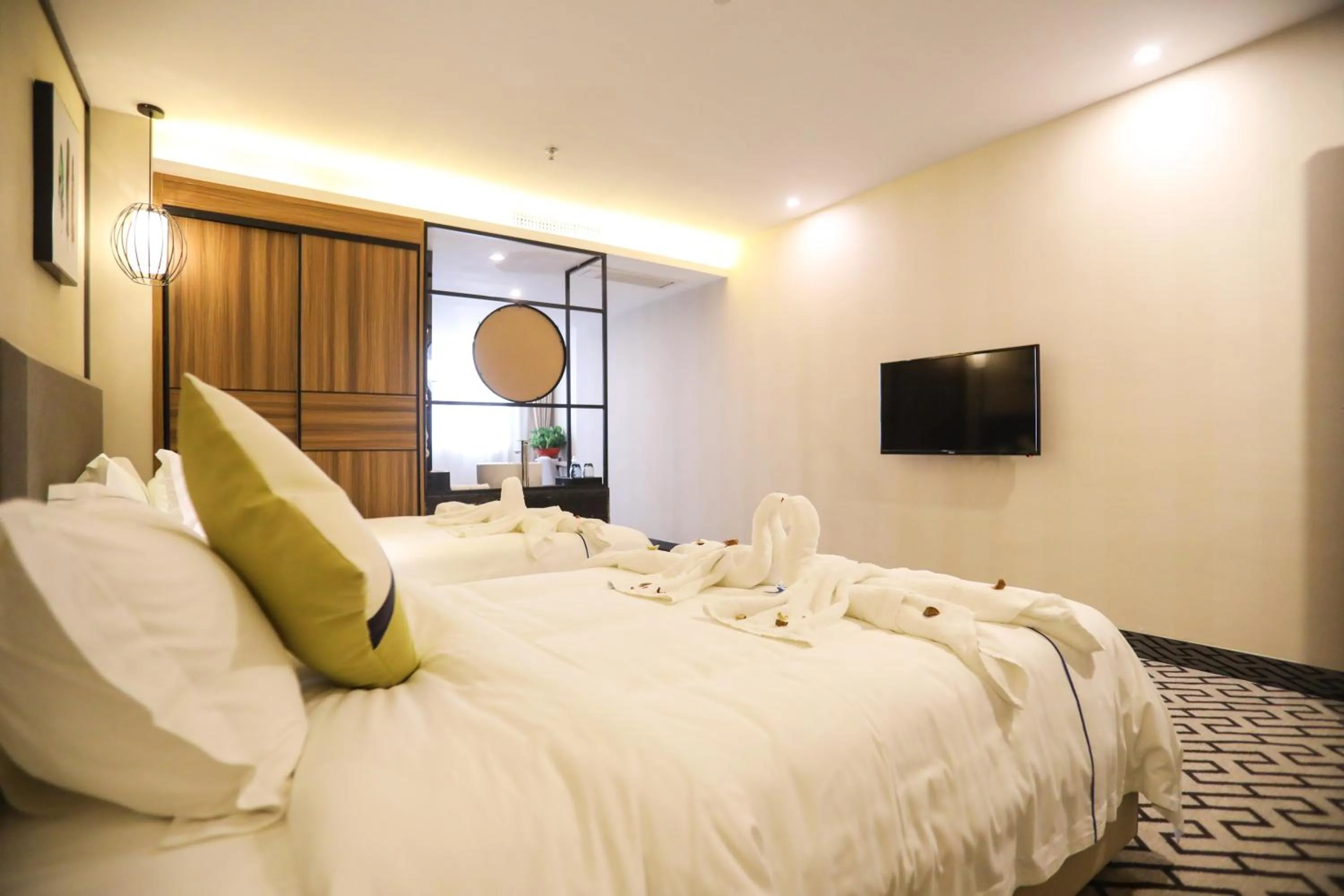 Bed in Guangzhou Homies Hotel