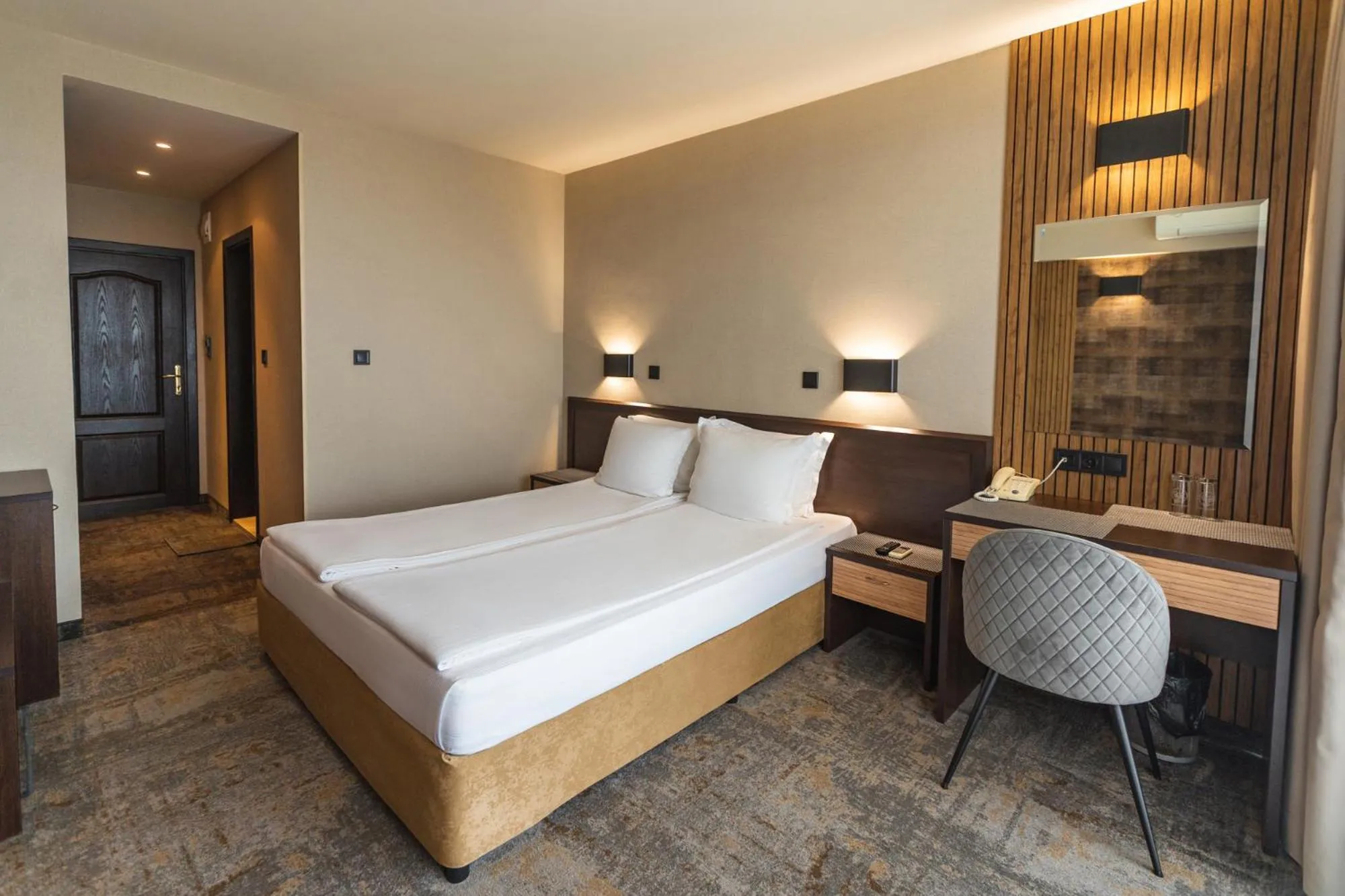 Bed in Kalithea Family Hotel