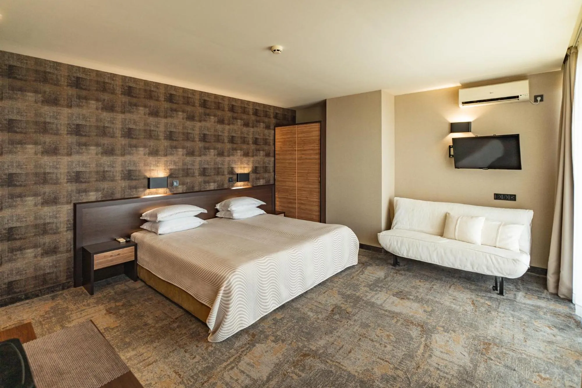 Bed in Kalithea Family Hotel