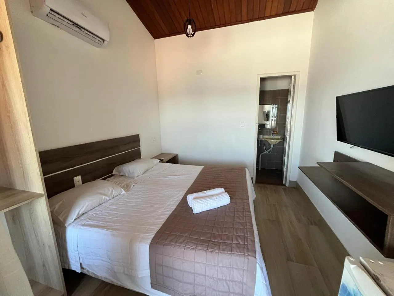 Bed in Pousada Farol do Morro