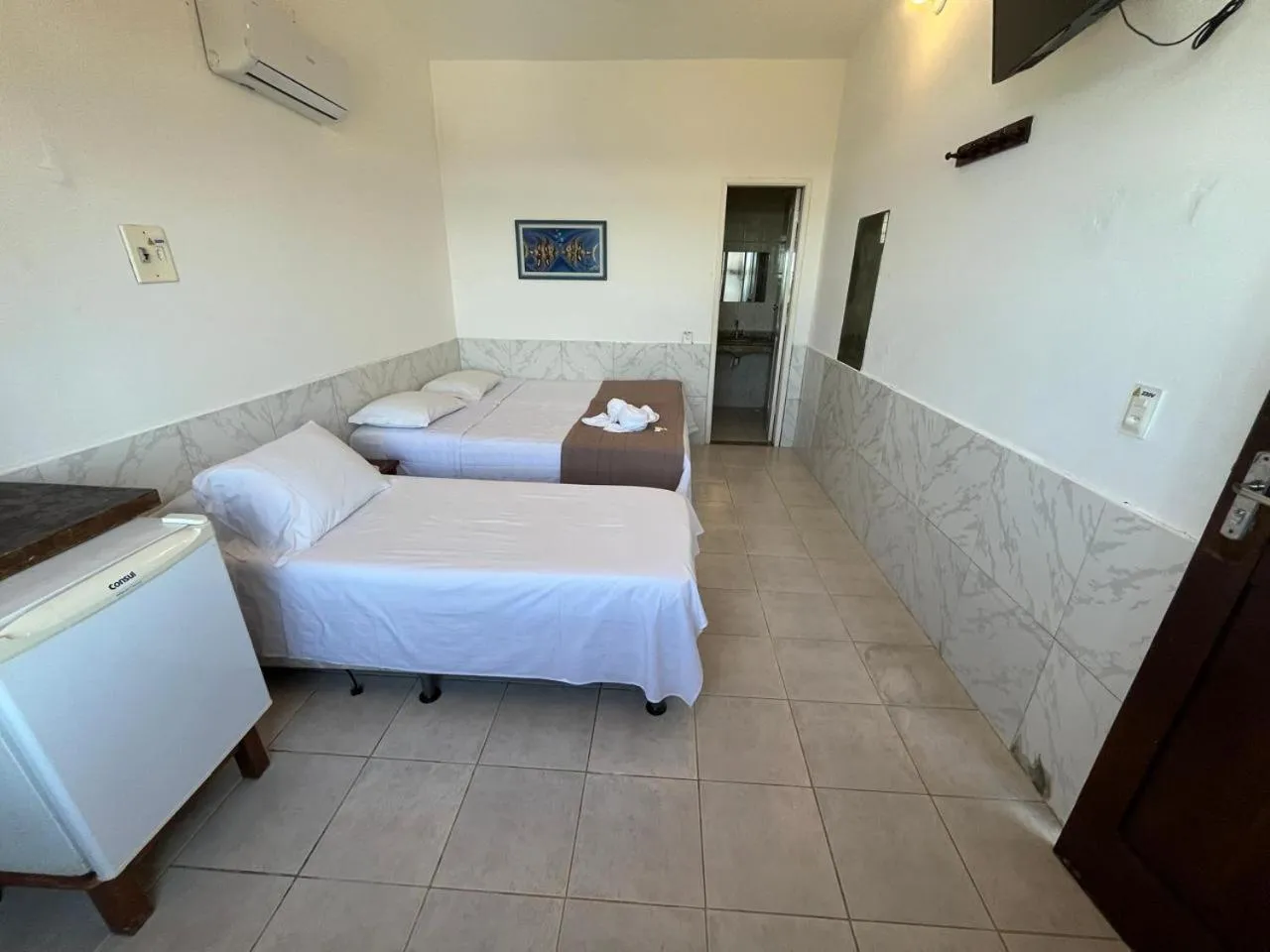 Bed in Pousada Farol do Morro