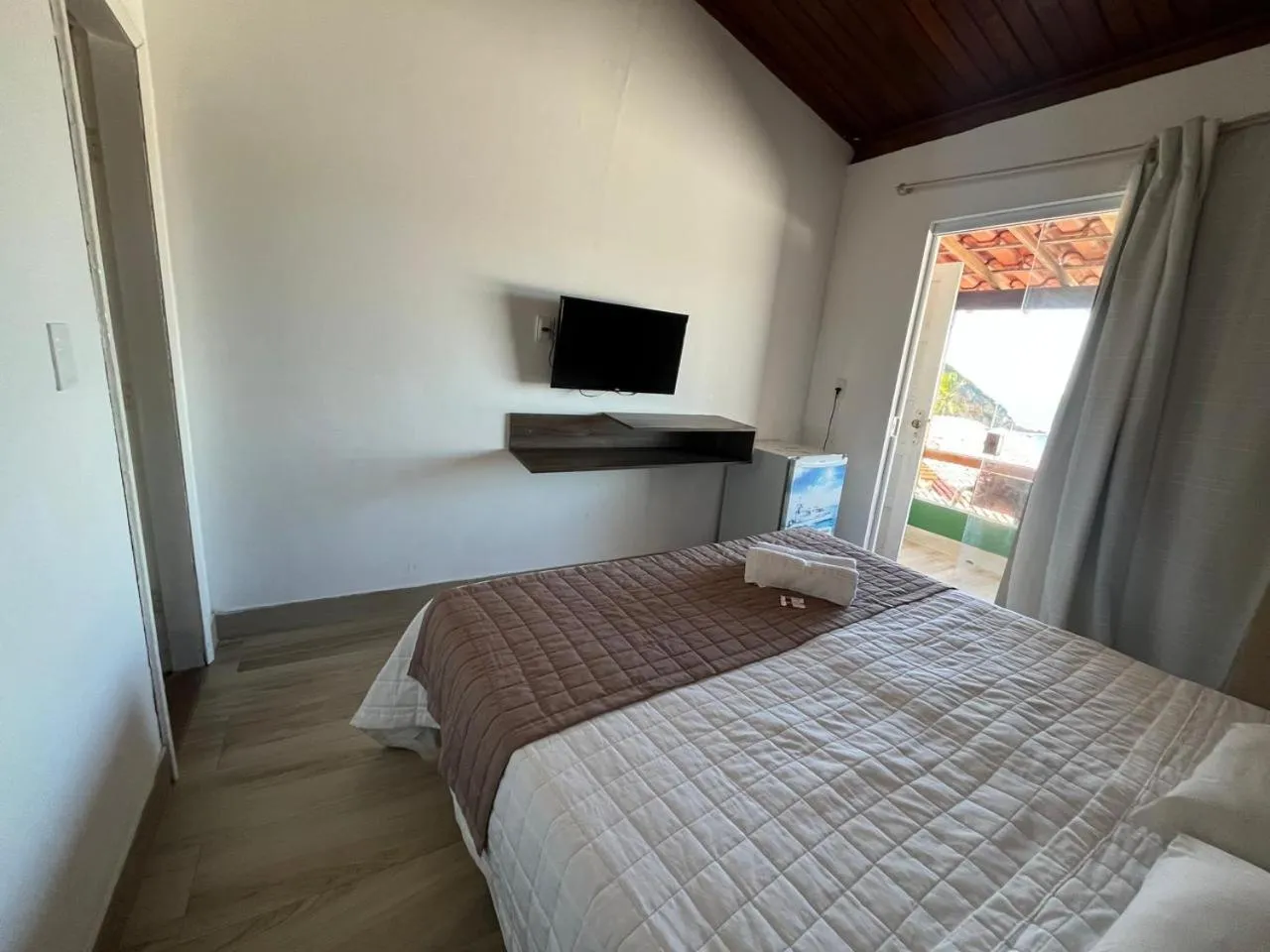 Bed in Pousada Farol do Morro