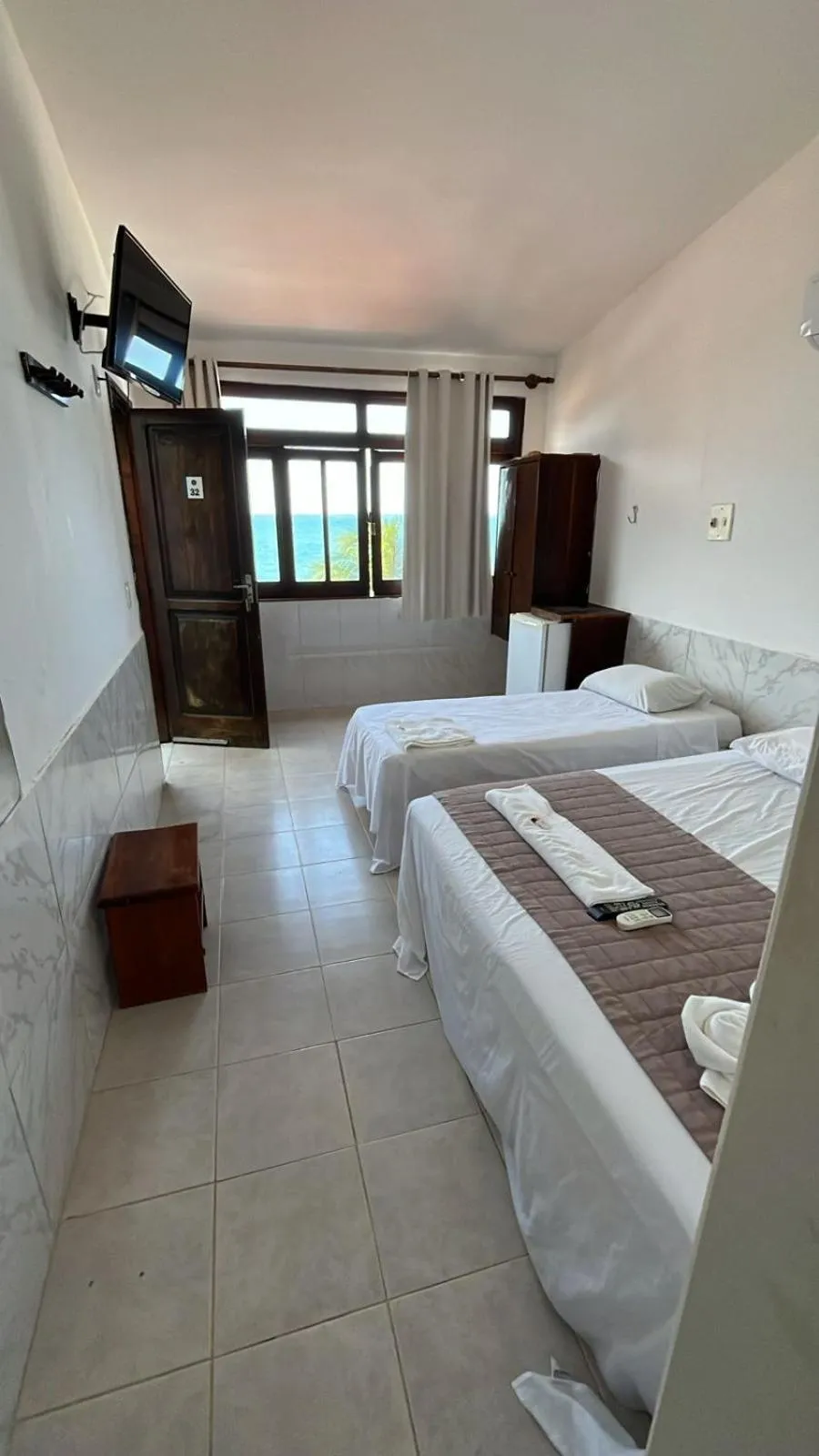 Bed in Pousada Farol do Morro