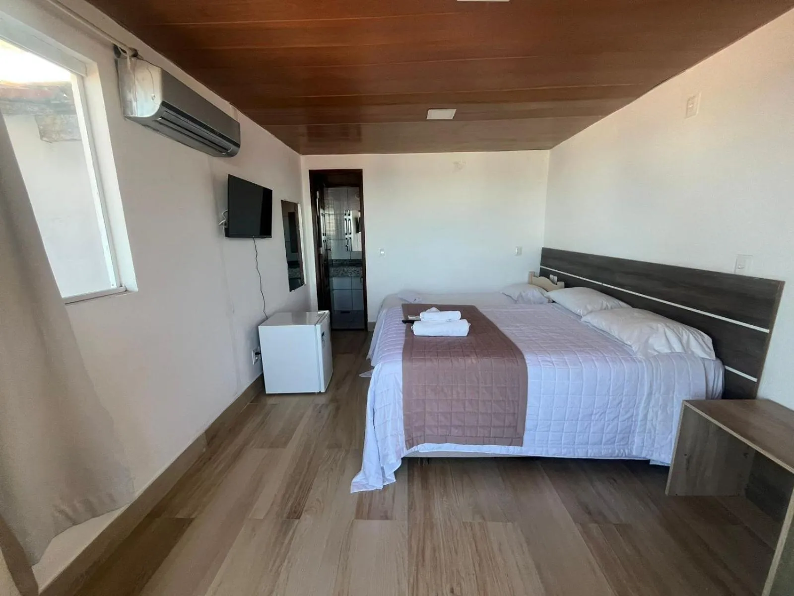 Bed in Pousada Farol do Morro