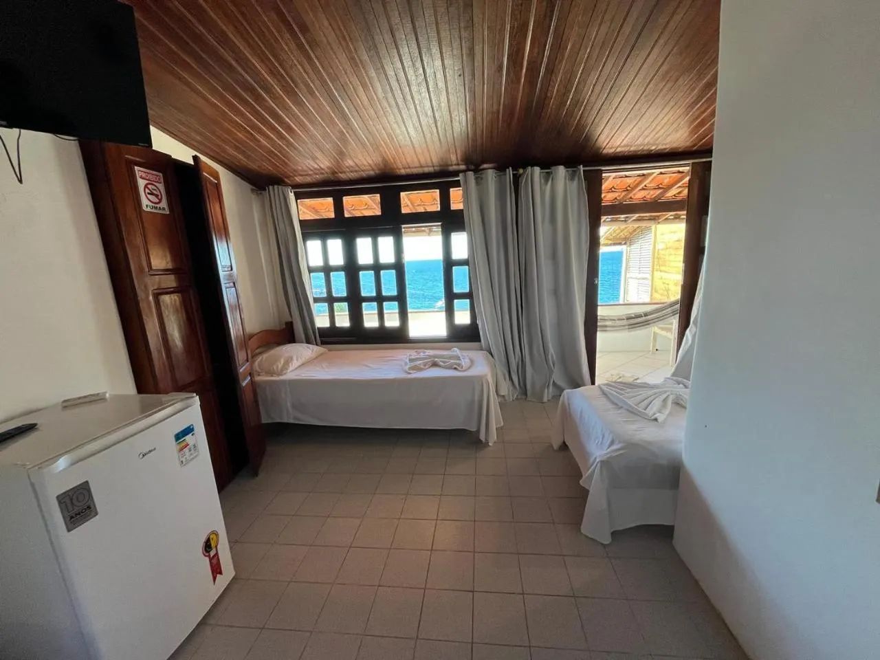 Bed in Pousada Farol do Morro