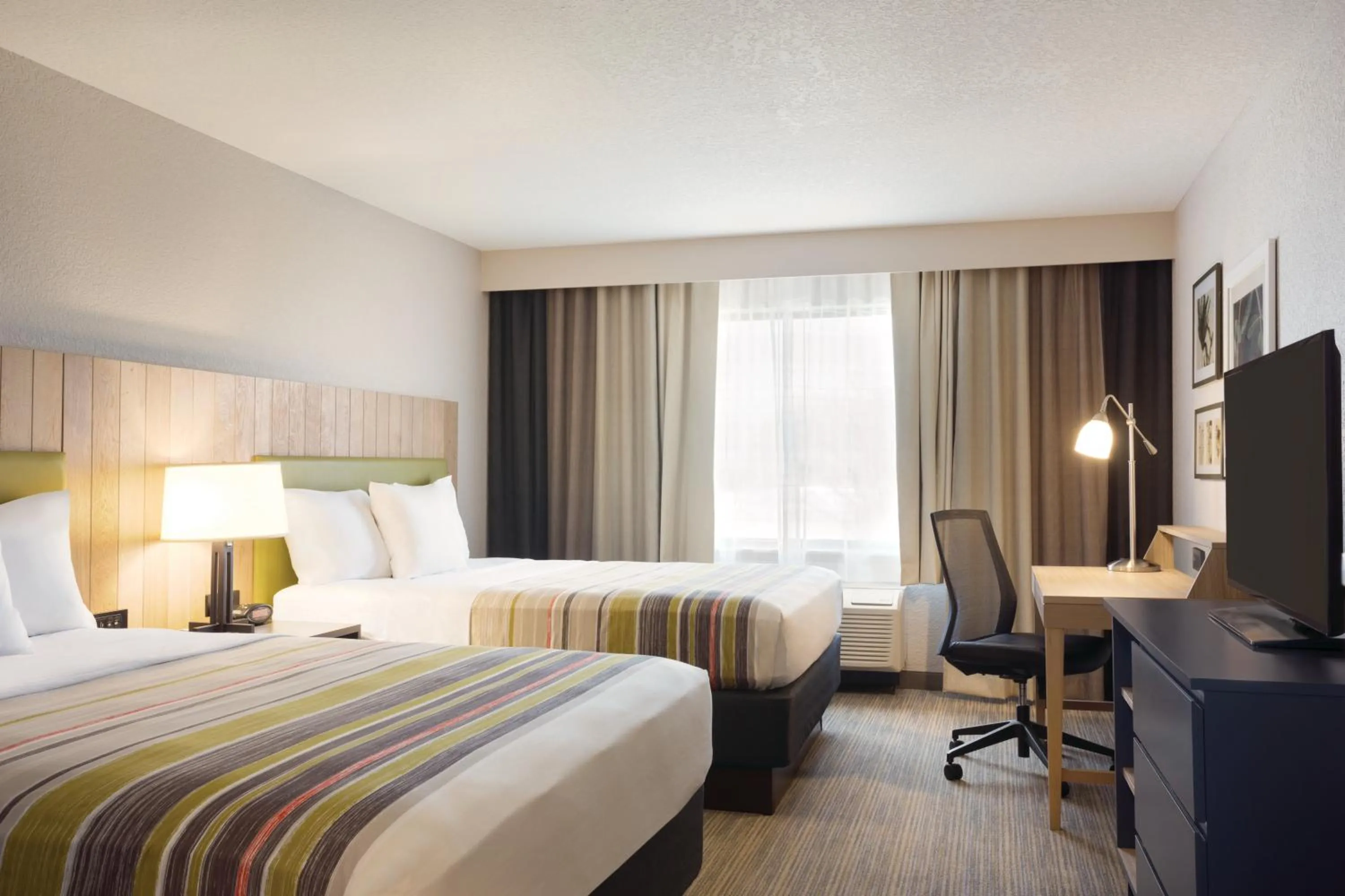 Photo of the whole room, Bed in Country Inn & Suites by Radisson, Lawrence, KS