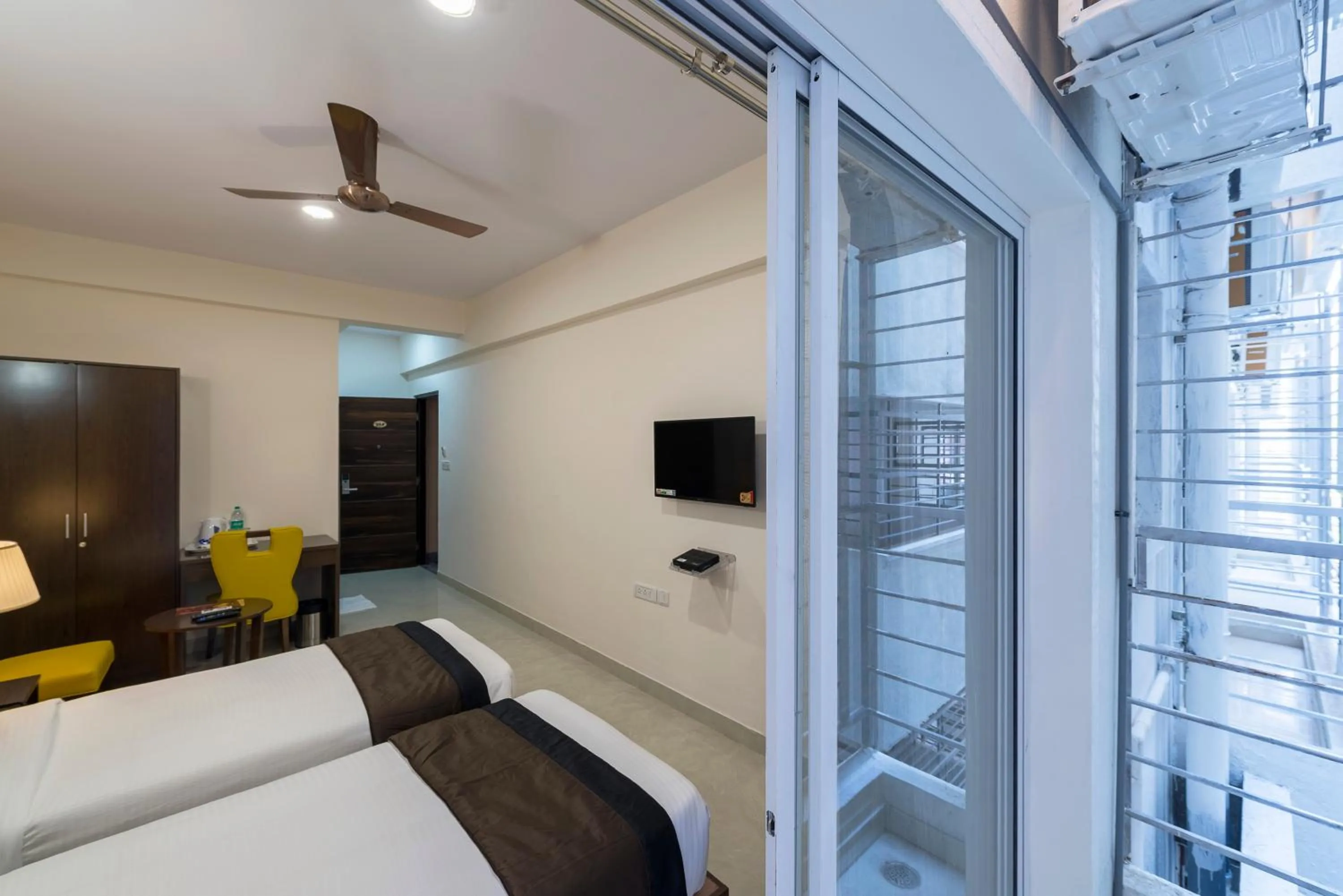 Photo of the whole room, Bed in Daffodil Delight - Manyata Tech Park