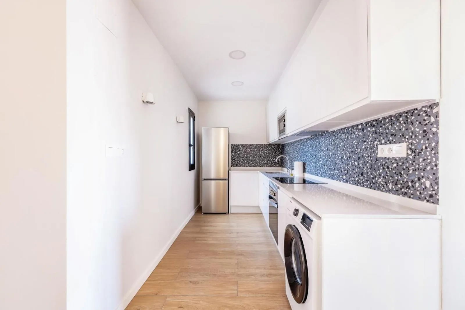 Kitchen or kitchenette in AinB Barcelona Sants Apartments