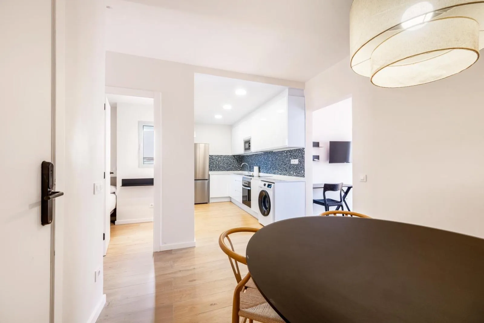 Kitchen or kitchenette in AinB Barcelona Sants Apartments