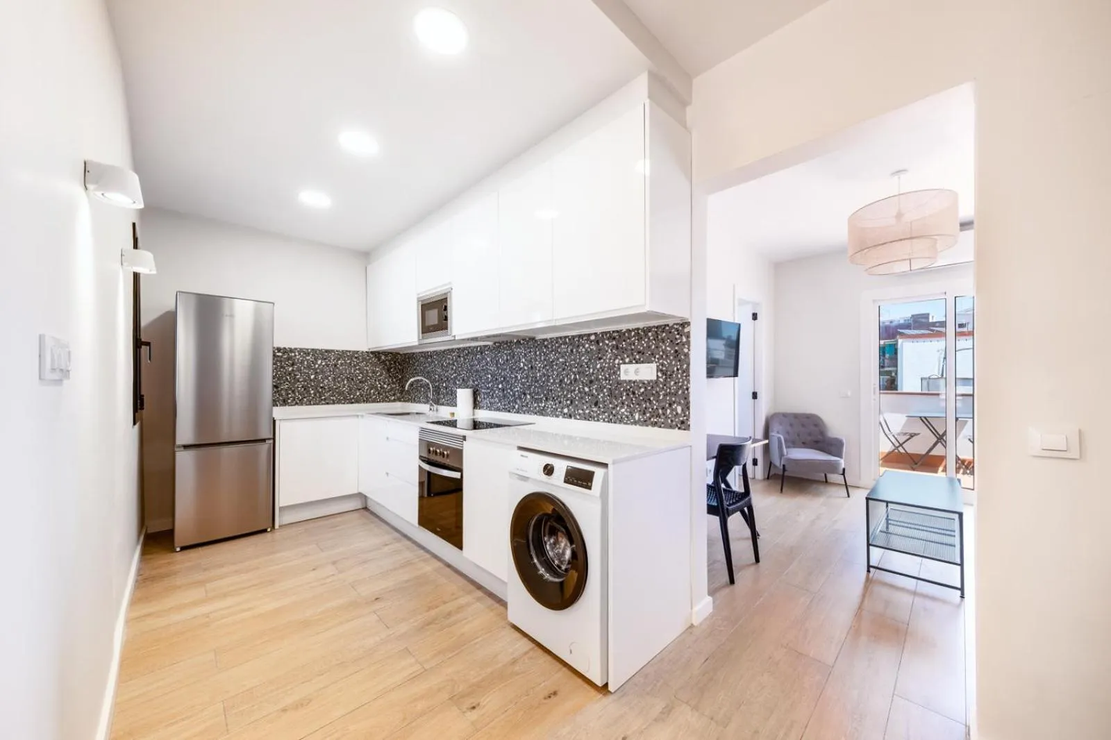 Kitchen or kitchenette in AinB Barcelona Sants Apartments