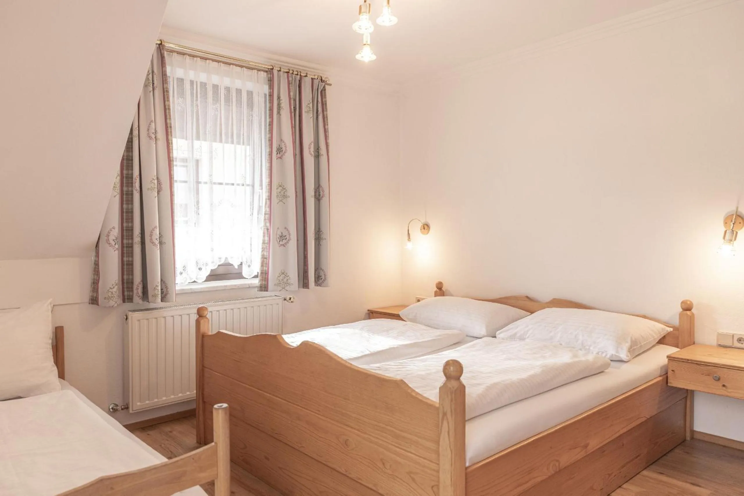 Photo of the whole room, Bed in Hotel Weissenstein