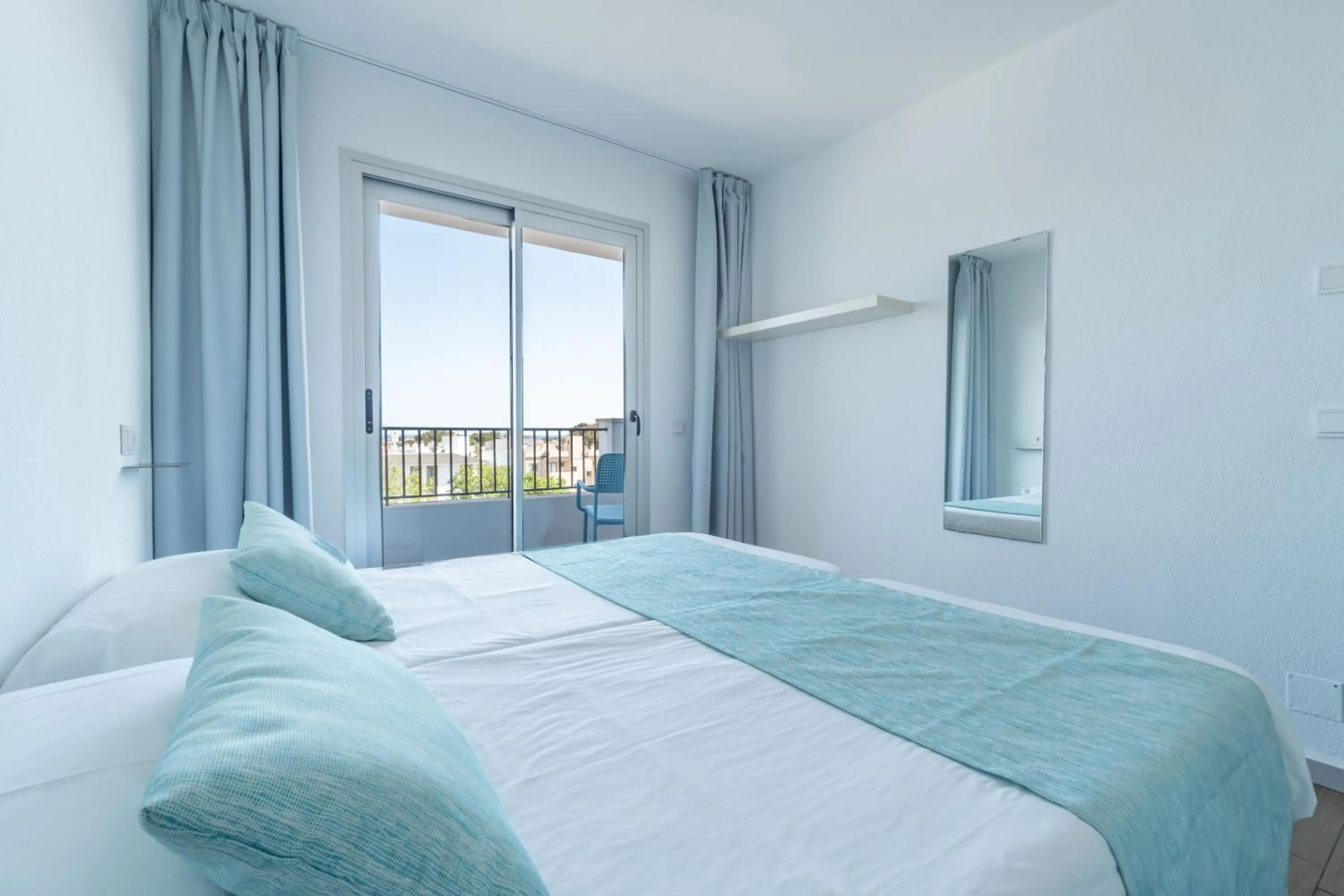 Bed in Apartaments La Perla Negra