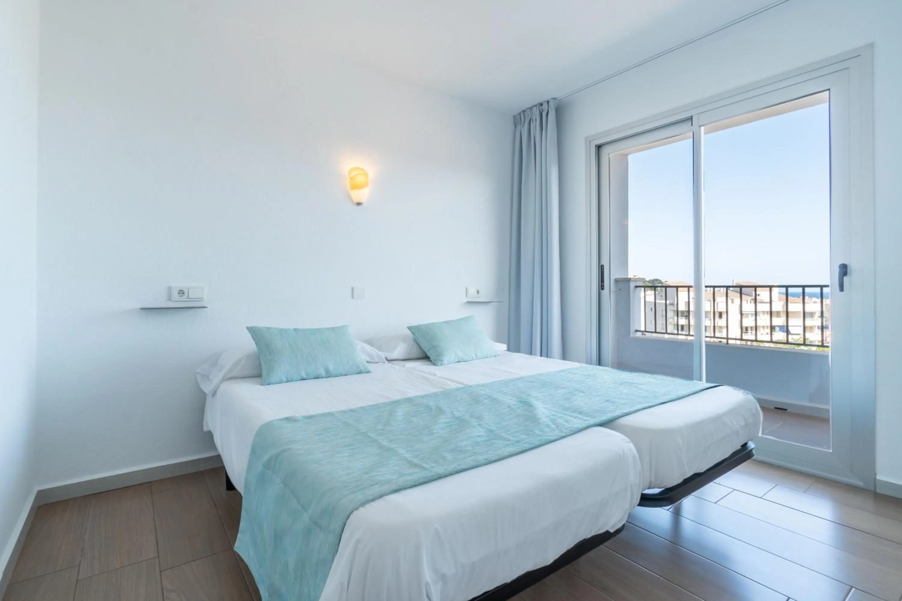 Bed in Apartaments La Perla Negra