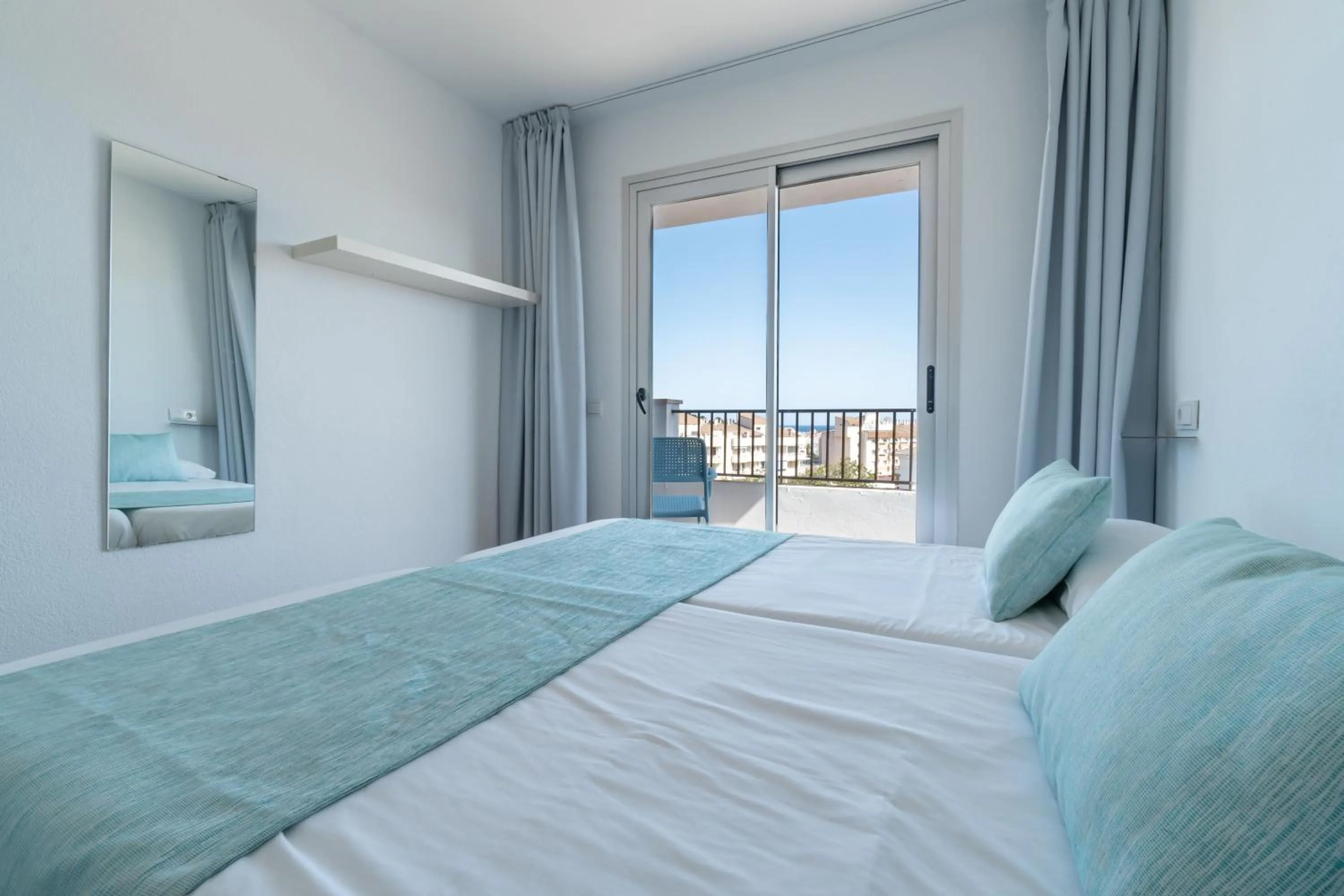 Bed in Apartaments La Perla Negra