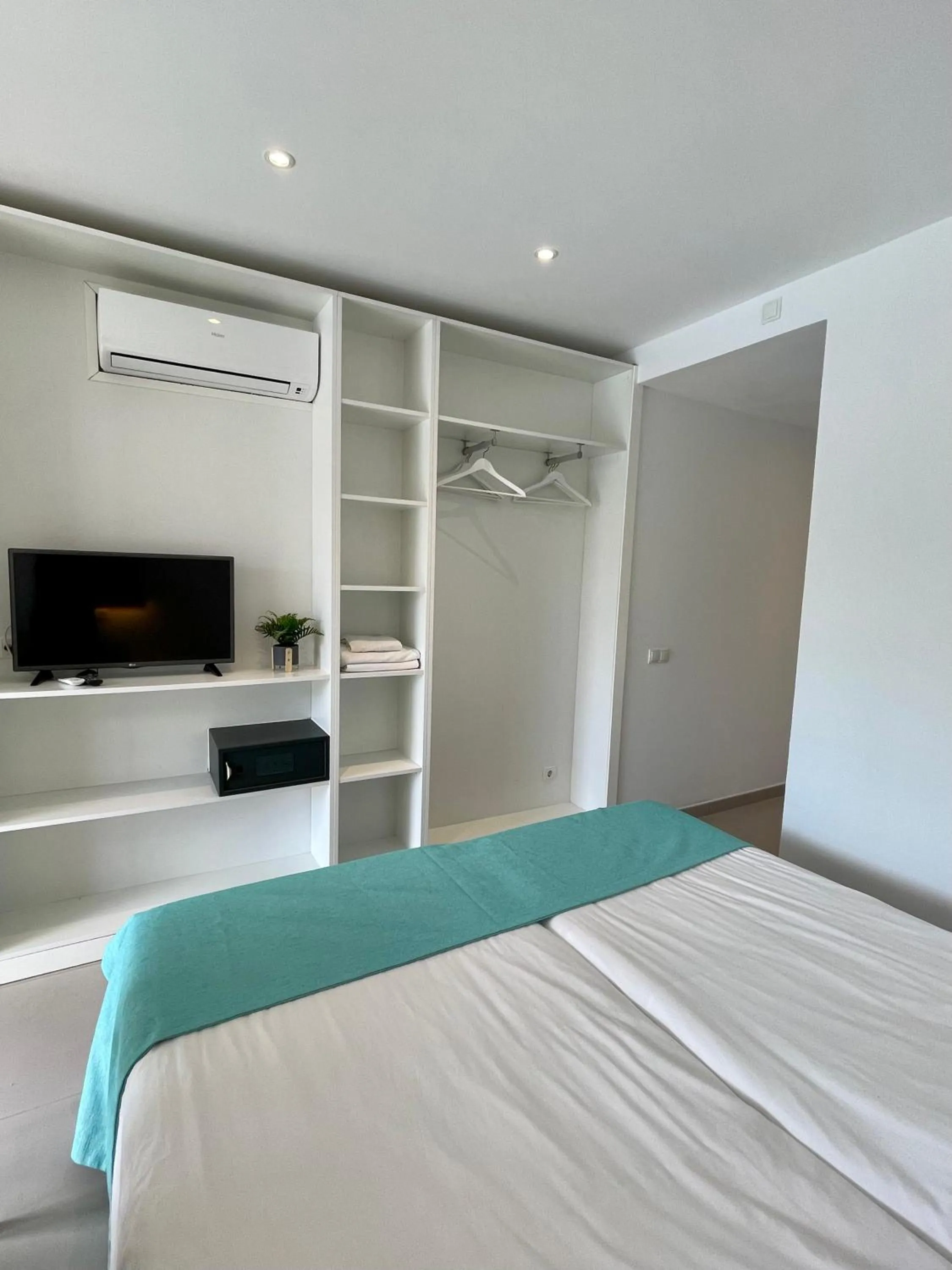 Bed in Apartaments La Perla Negra