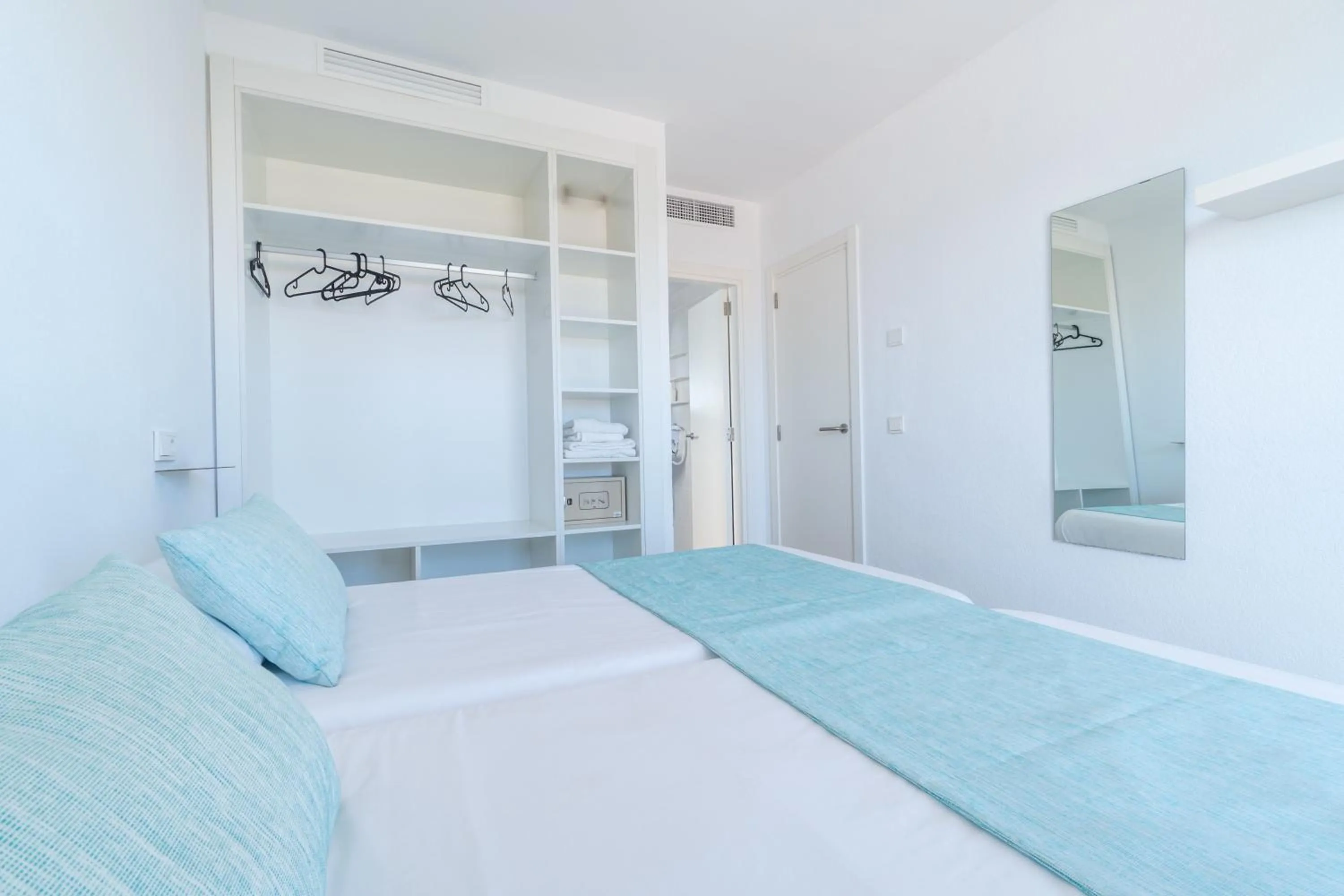 Bed in Apartaments La Perla Negra