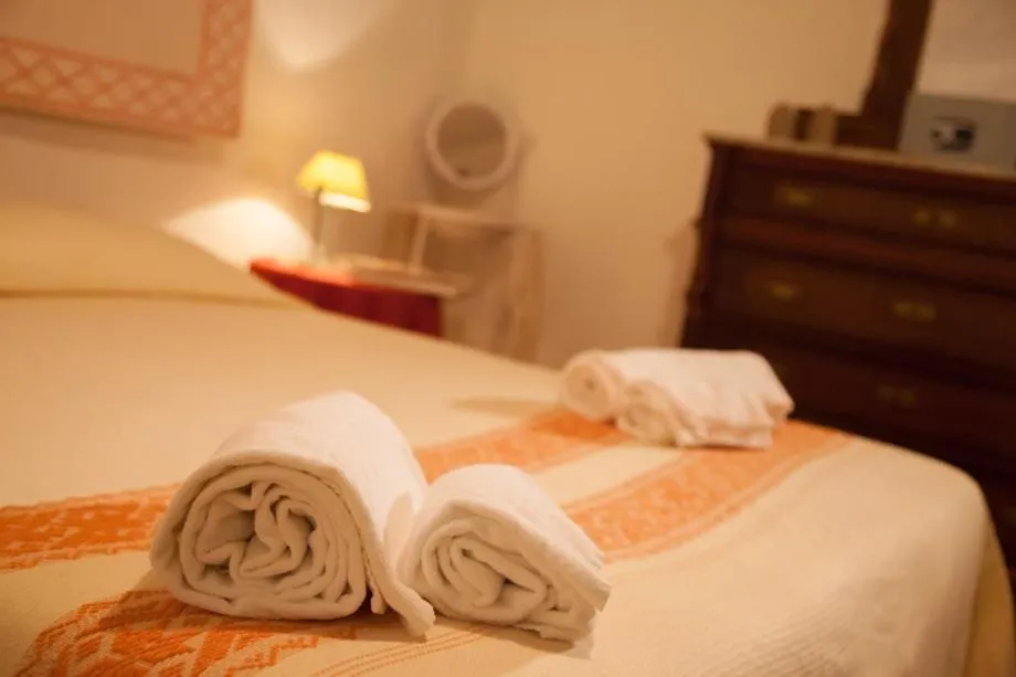 Bed in Su Cantaru Guesthouse