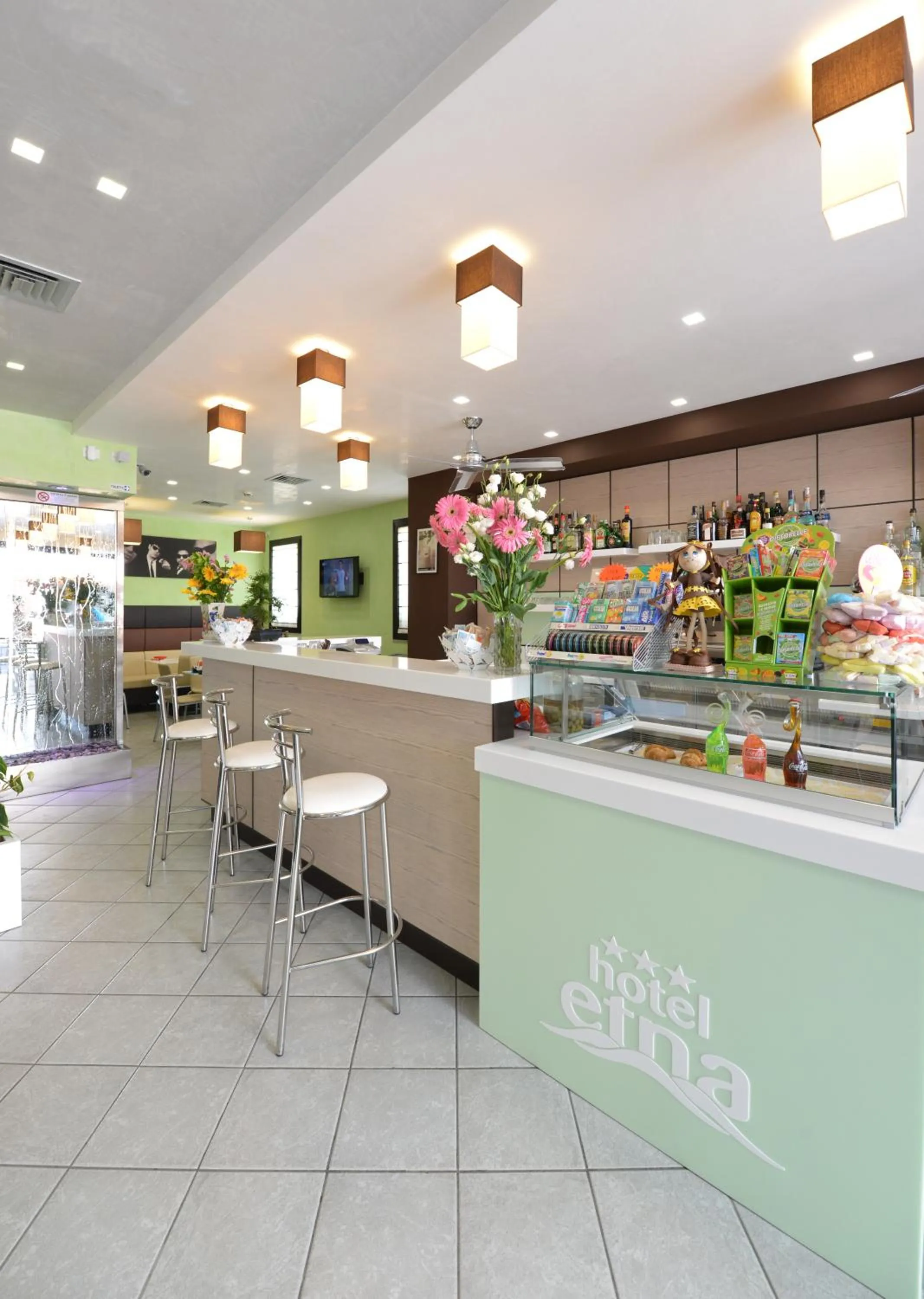 Communal lounge/ TV room in Hotel Etna