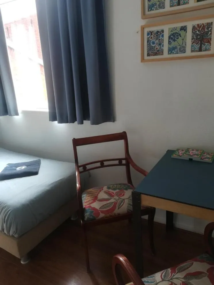 Seating area, Bed in Simplon Hostel