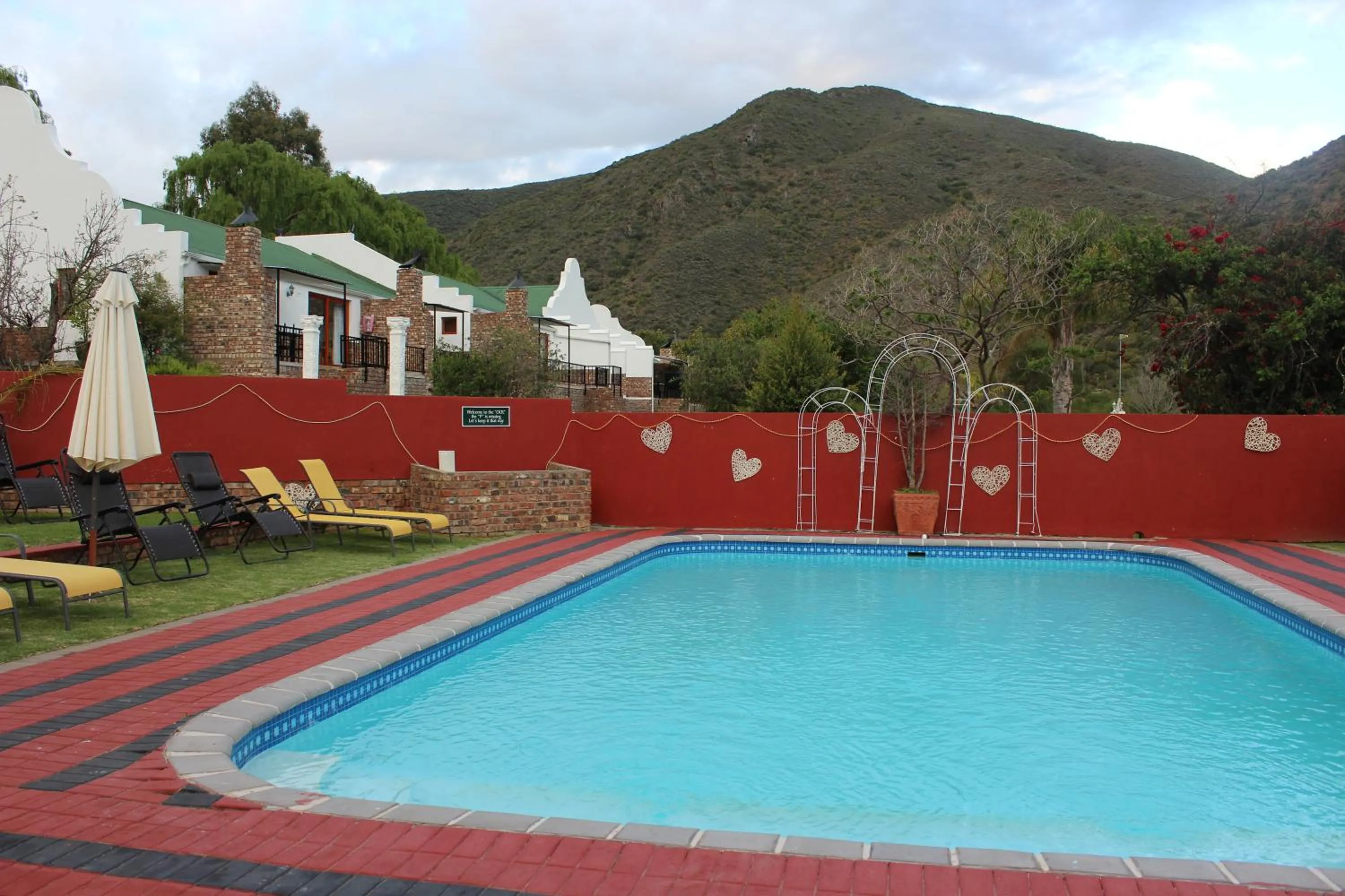 Pool view in De Oude Meul Country Lodge & Restaurant