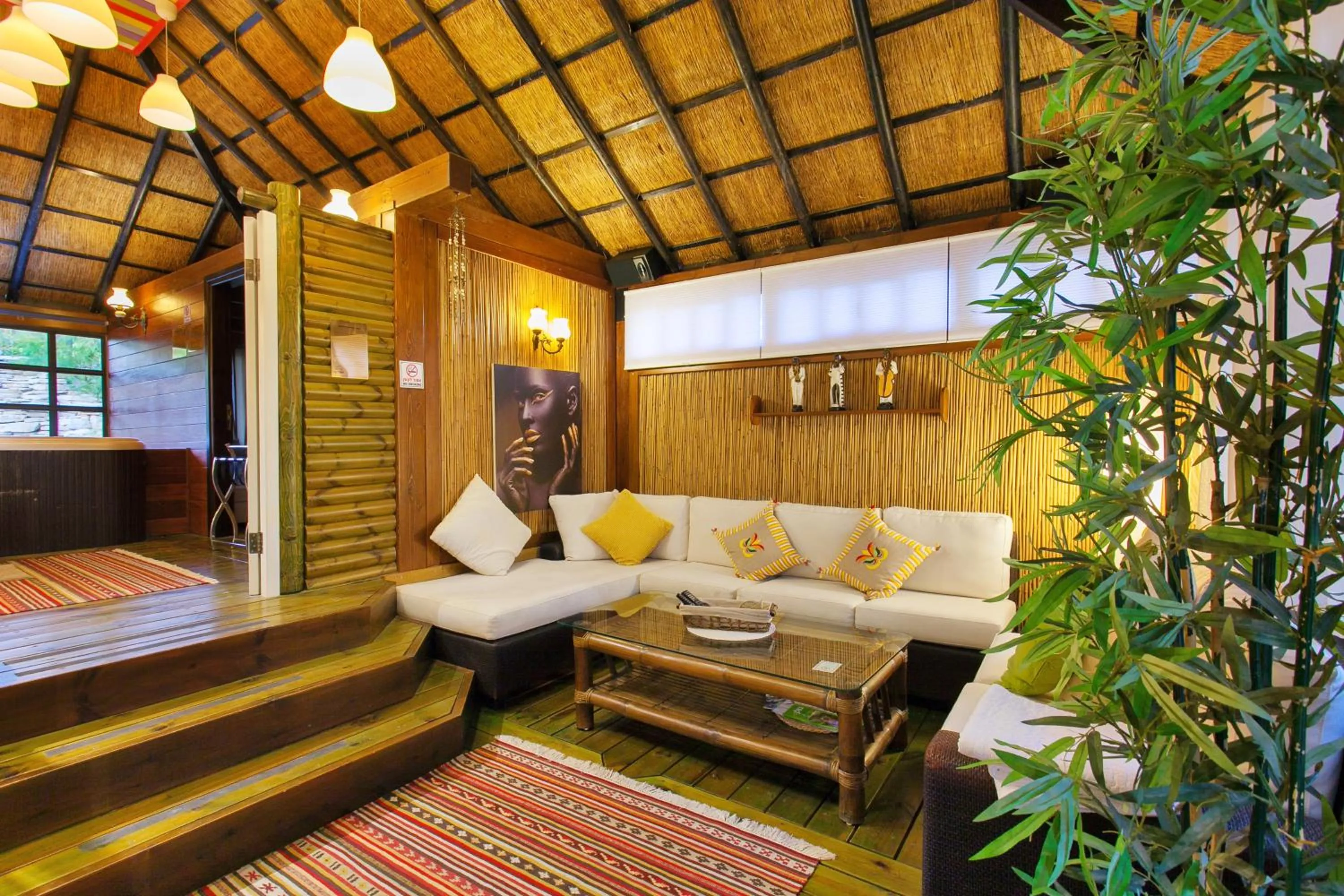 Photo of the whole room, Bed in Out of Africa Resort