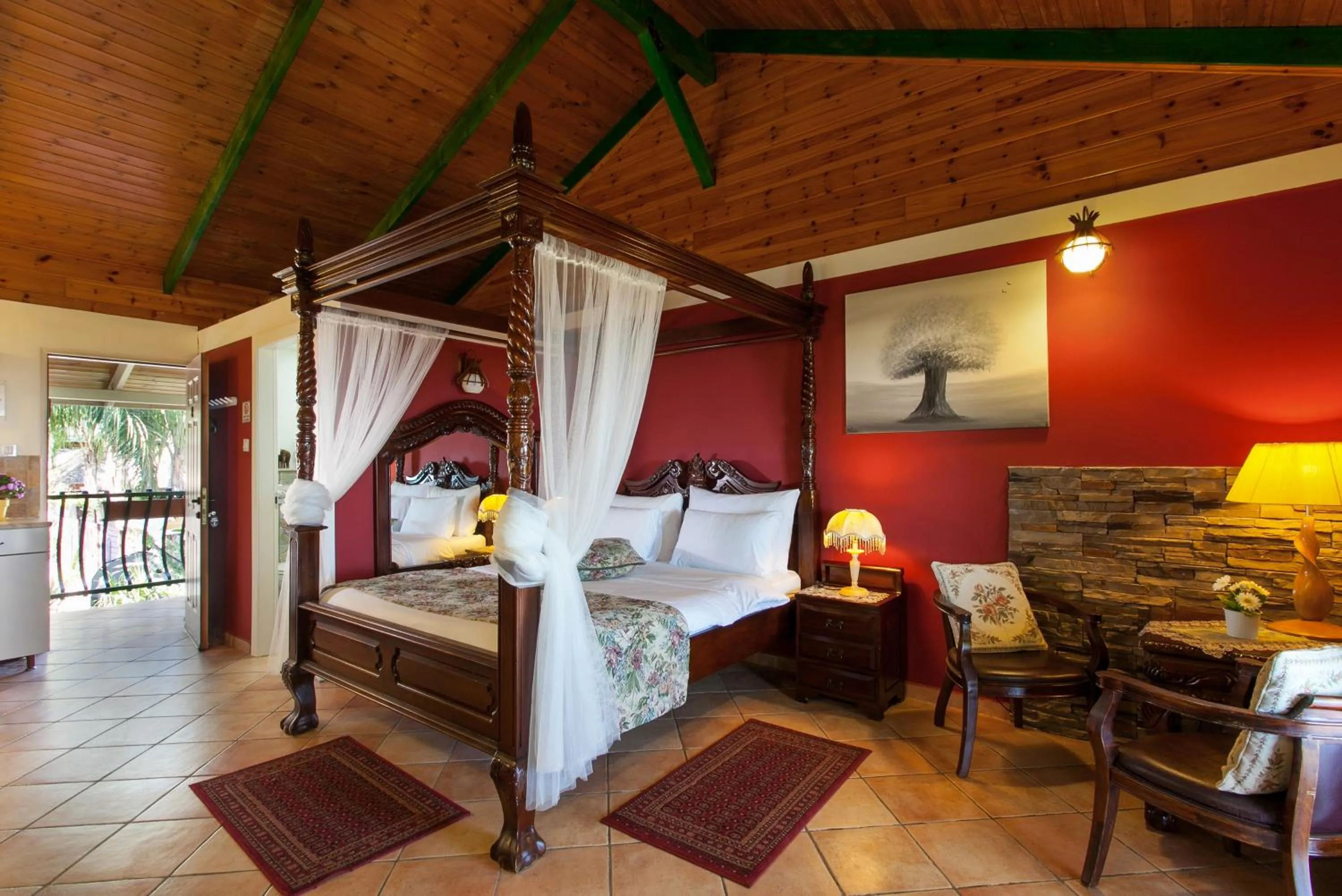 Photo of the whole room, Bed in Out of Africa Resort
