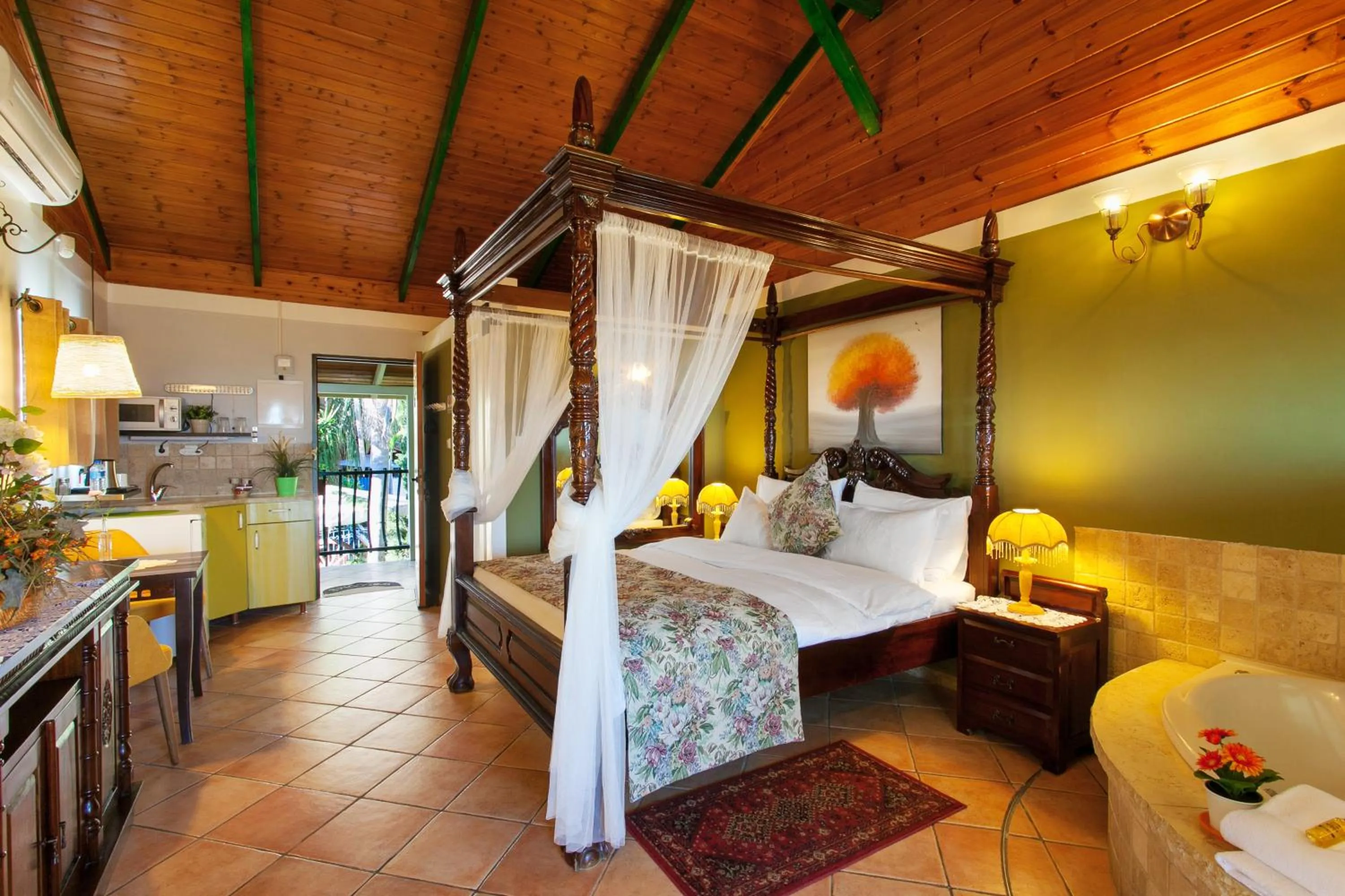 Photo of the whole room, Bed in Out of Africa Resort