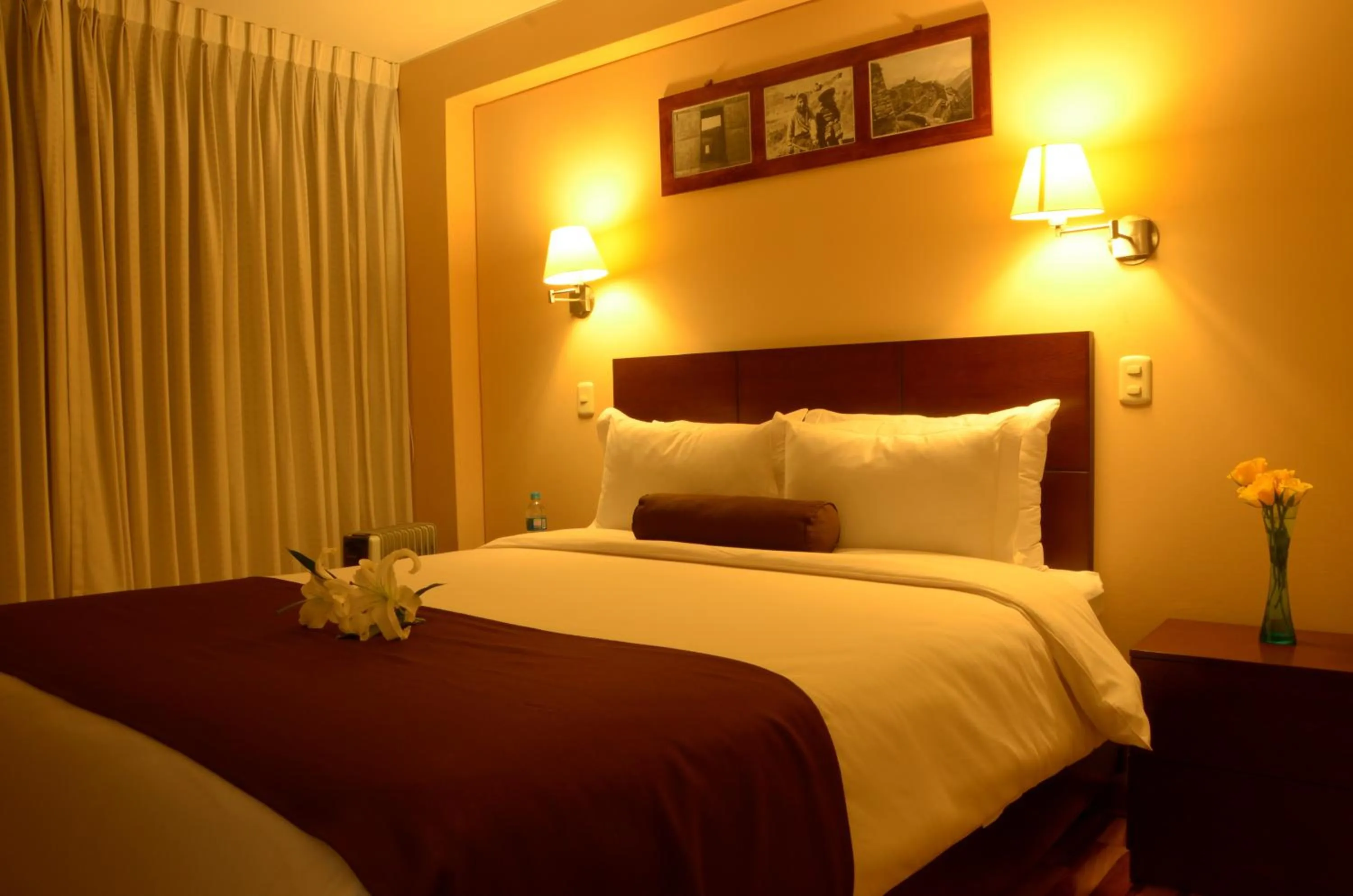 Bed in Kapac Inn Hotel