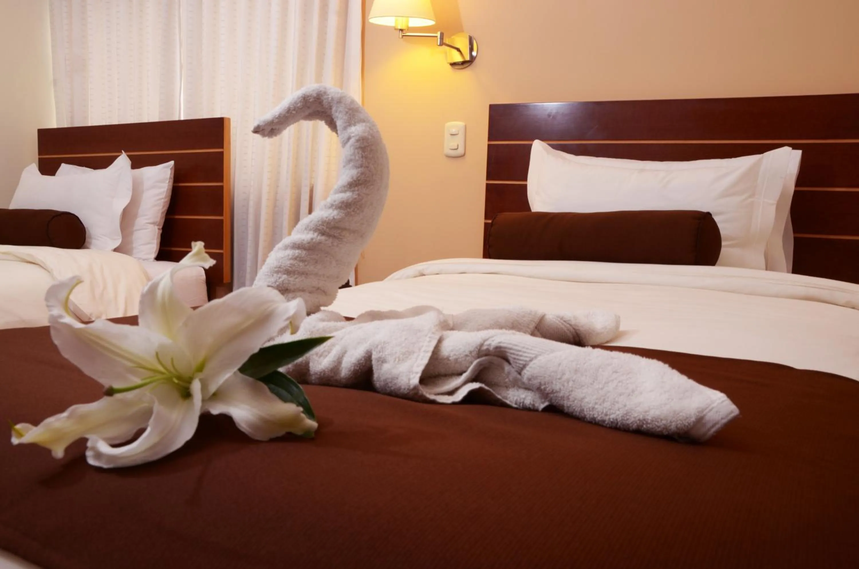 Bed in Kapac Inn Hotel