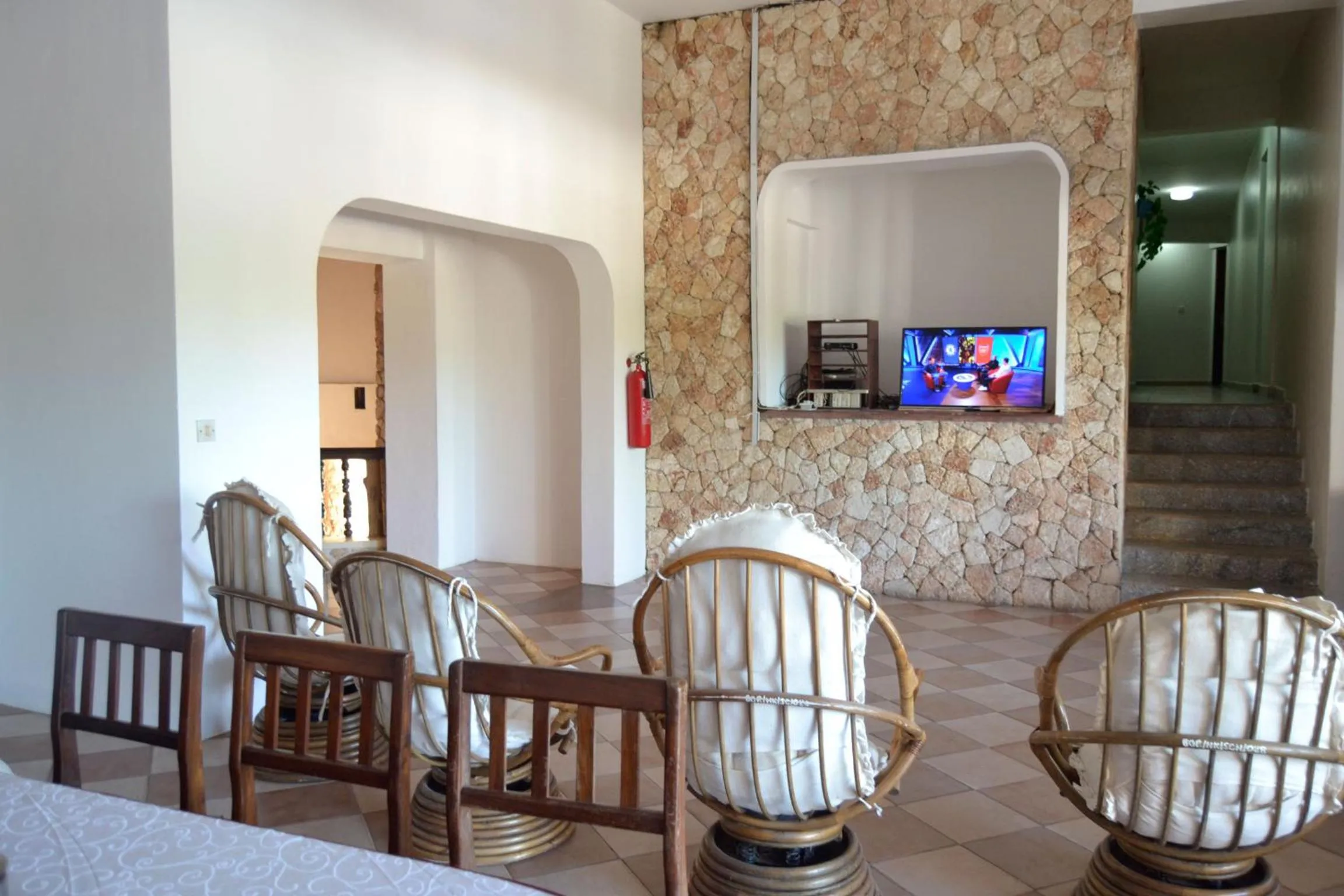 Communal lounge/ TV room in Serene Hotel