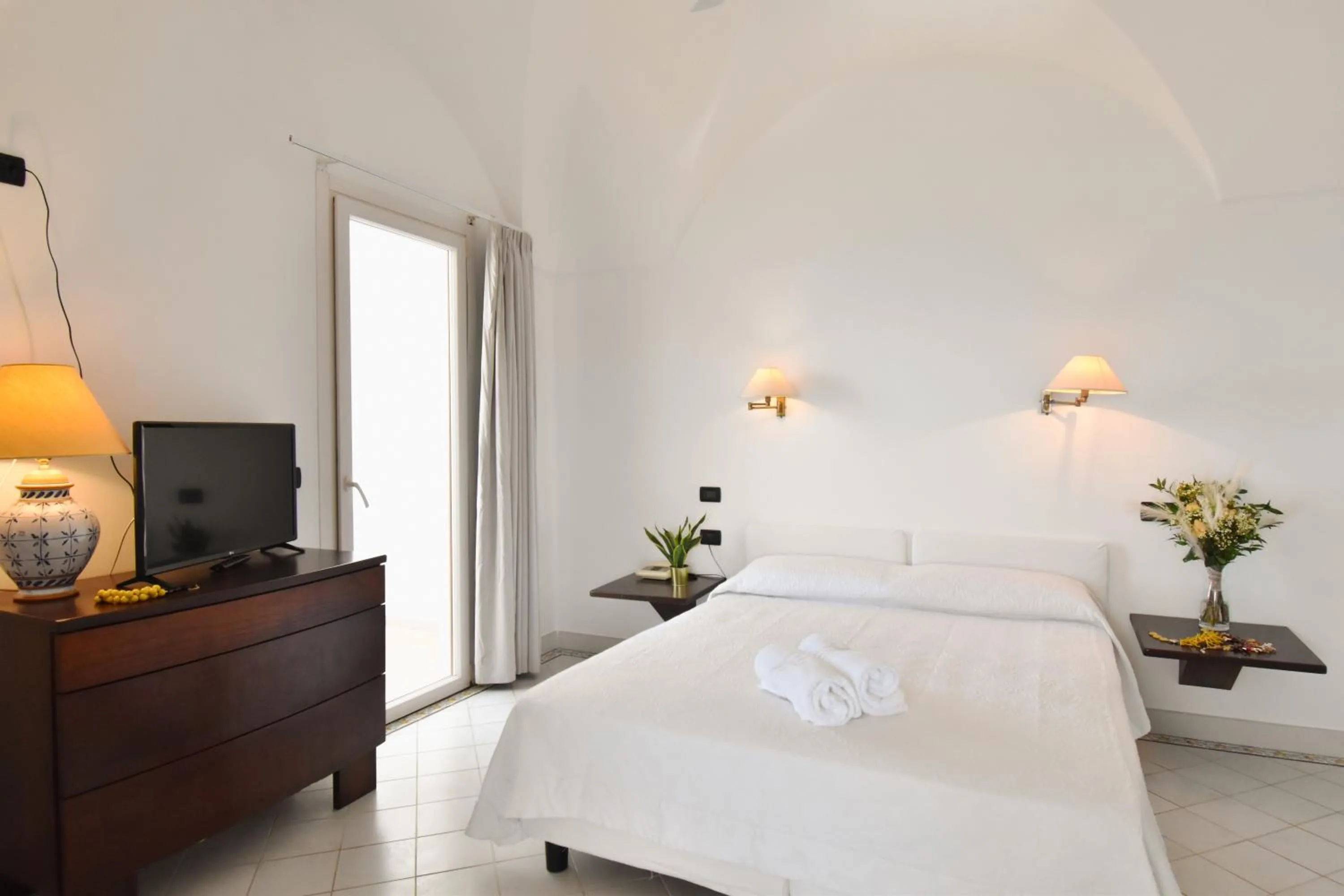 Bed in Mursia Wellness Hotel