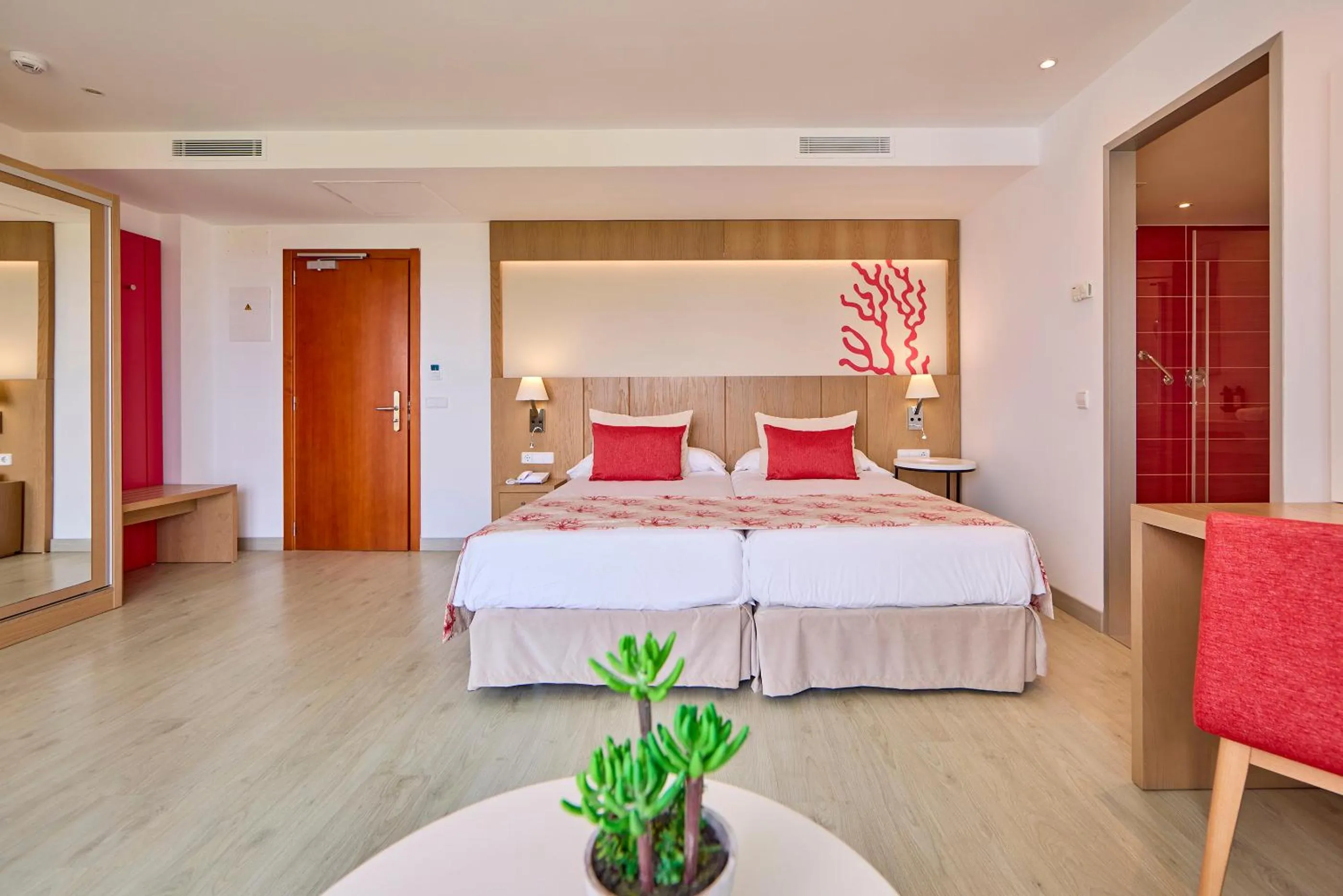 Bed in Universal Hotel Perla