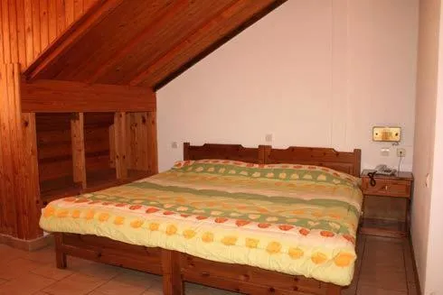 Bed in Vicky Rooms & Apartments