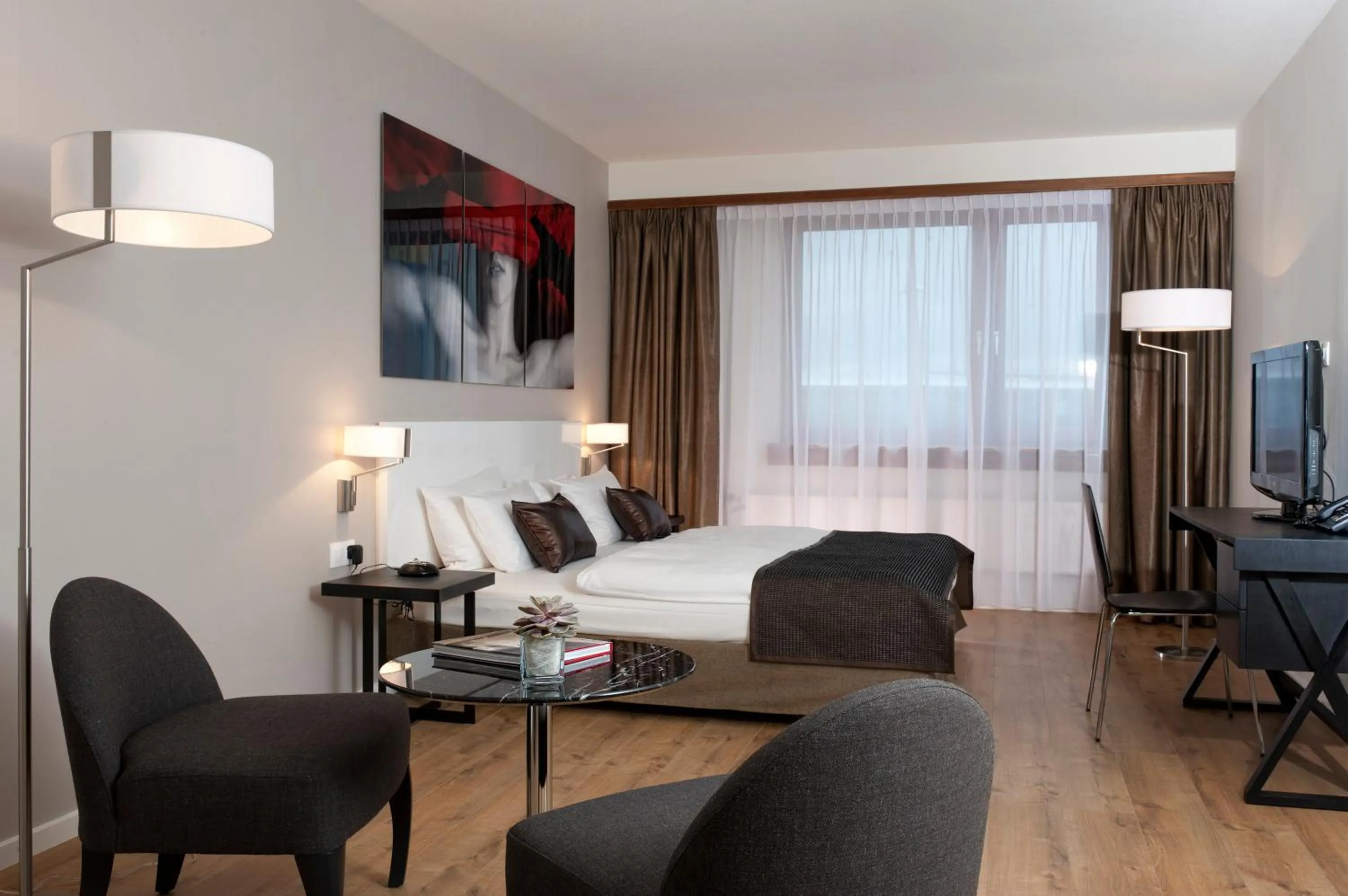 Photo of the whole room, Bed in Wyndham Stuttgart Airport Messe