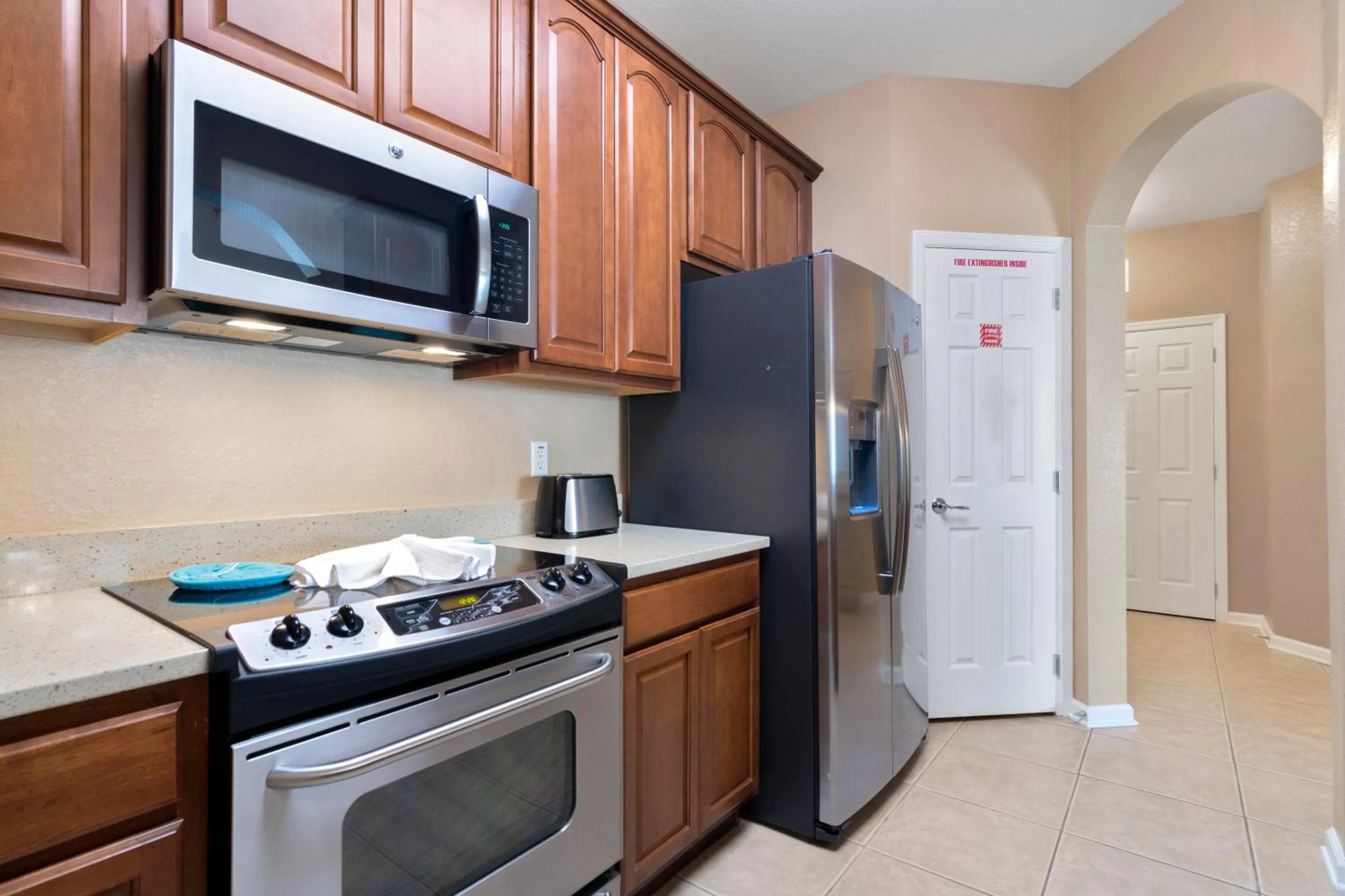 Kitchen or kitchenette in Orlando Resort Rentals at Universal Boulevard